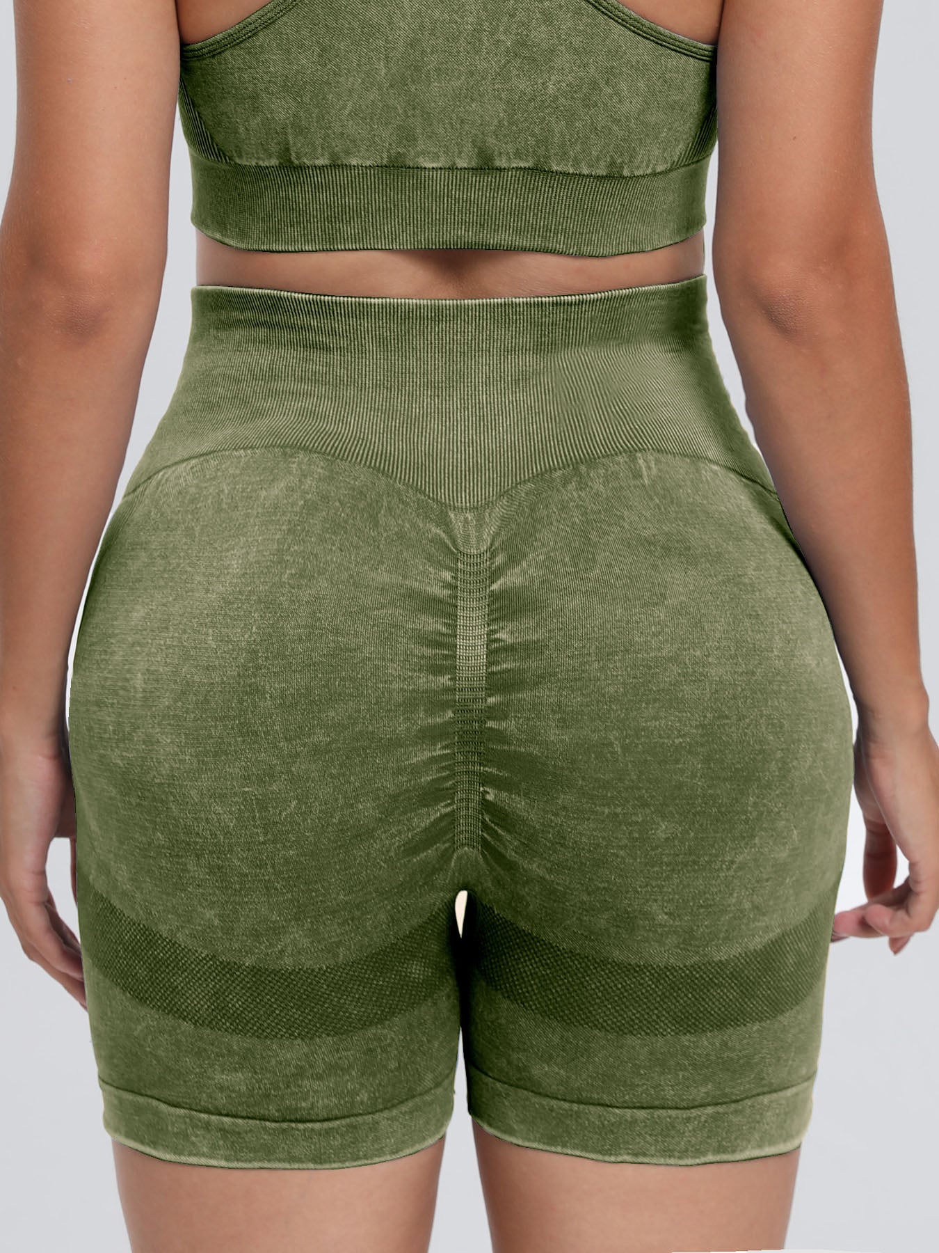Solid drawstring smocked waist pocketed shorts.