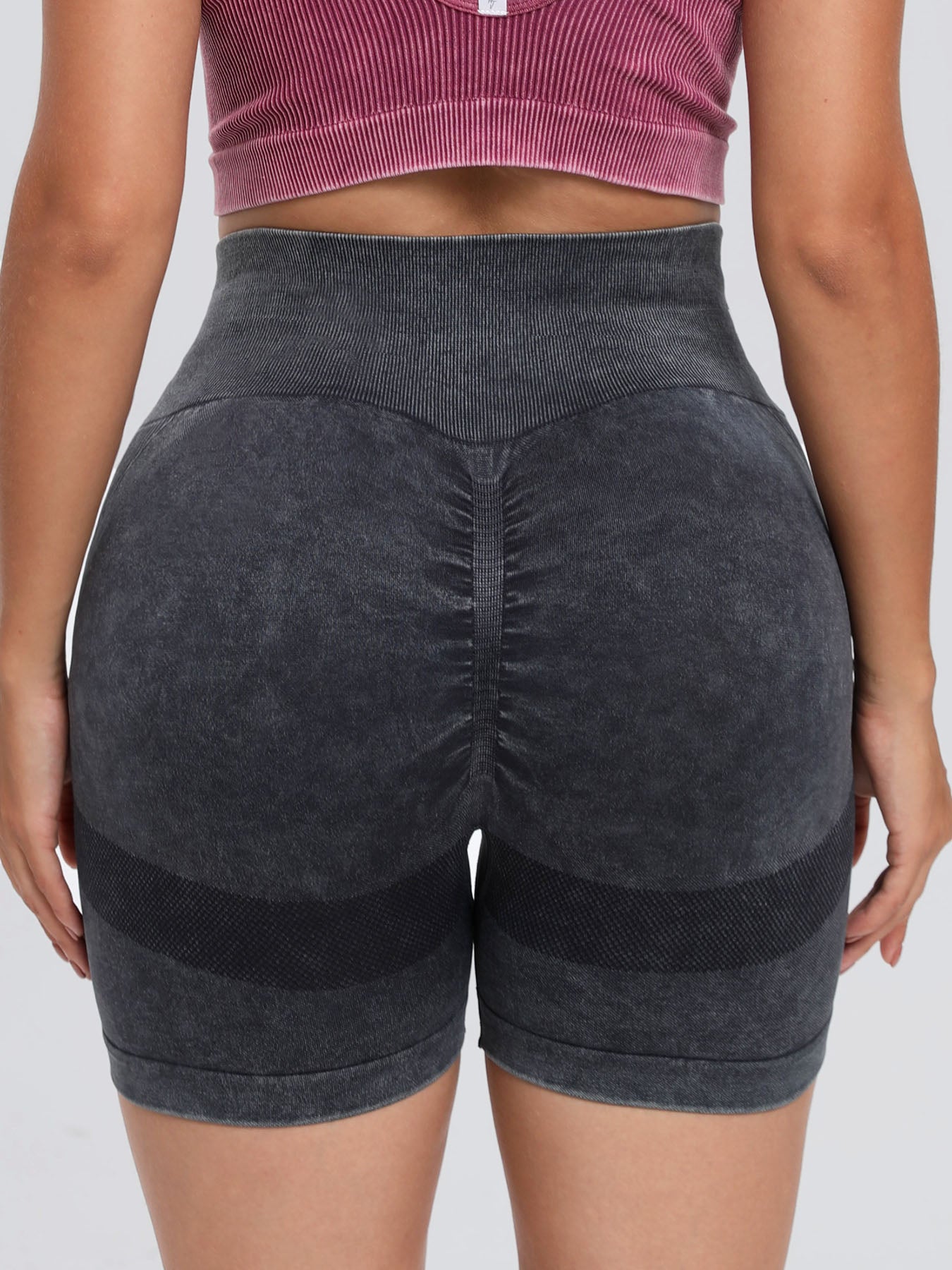 Solid drawstring smocked waist pocketed shorts.