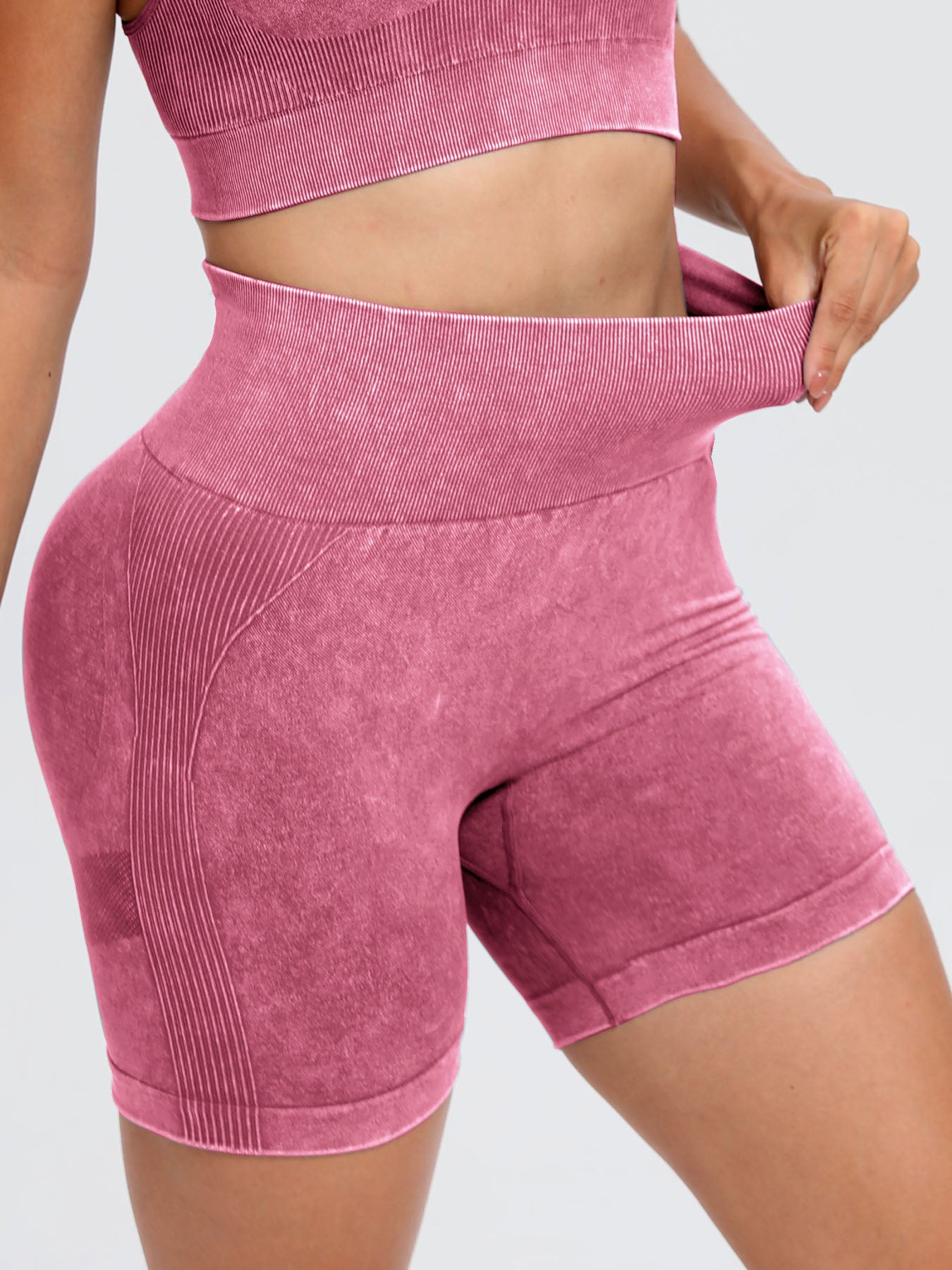 Solid drawstring smocked waist pocketed shorts.