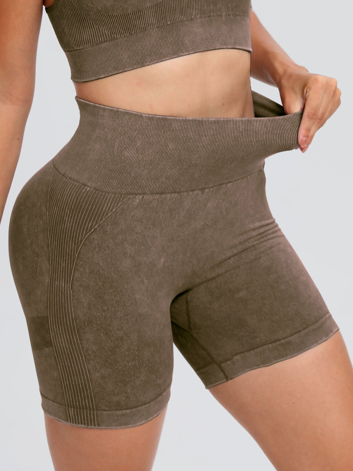Solid drawstring smocked waist pocketed shorts.