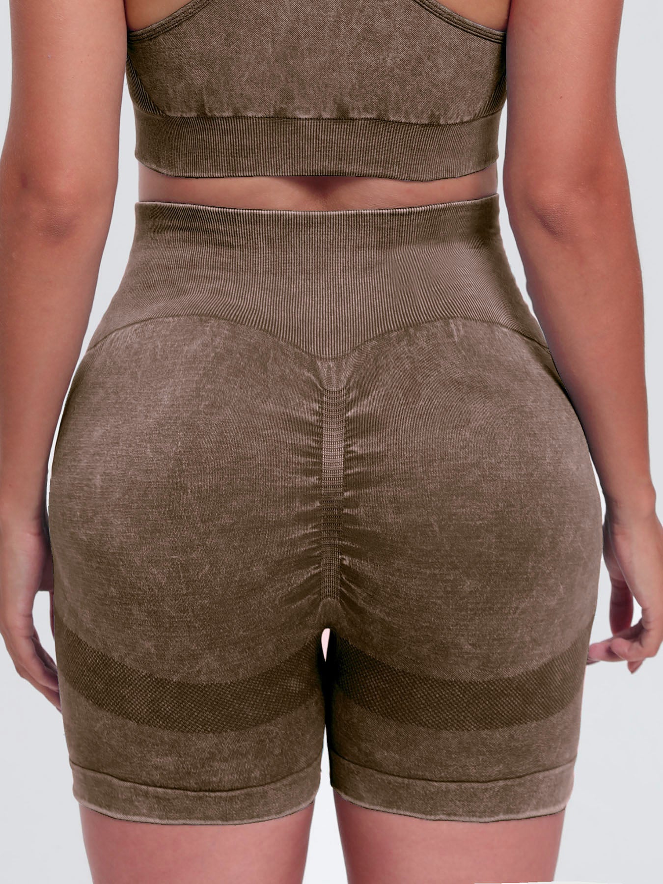Solid drawstring smocked waist pocketed shorts.