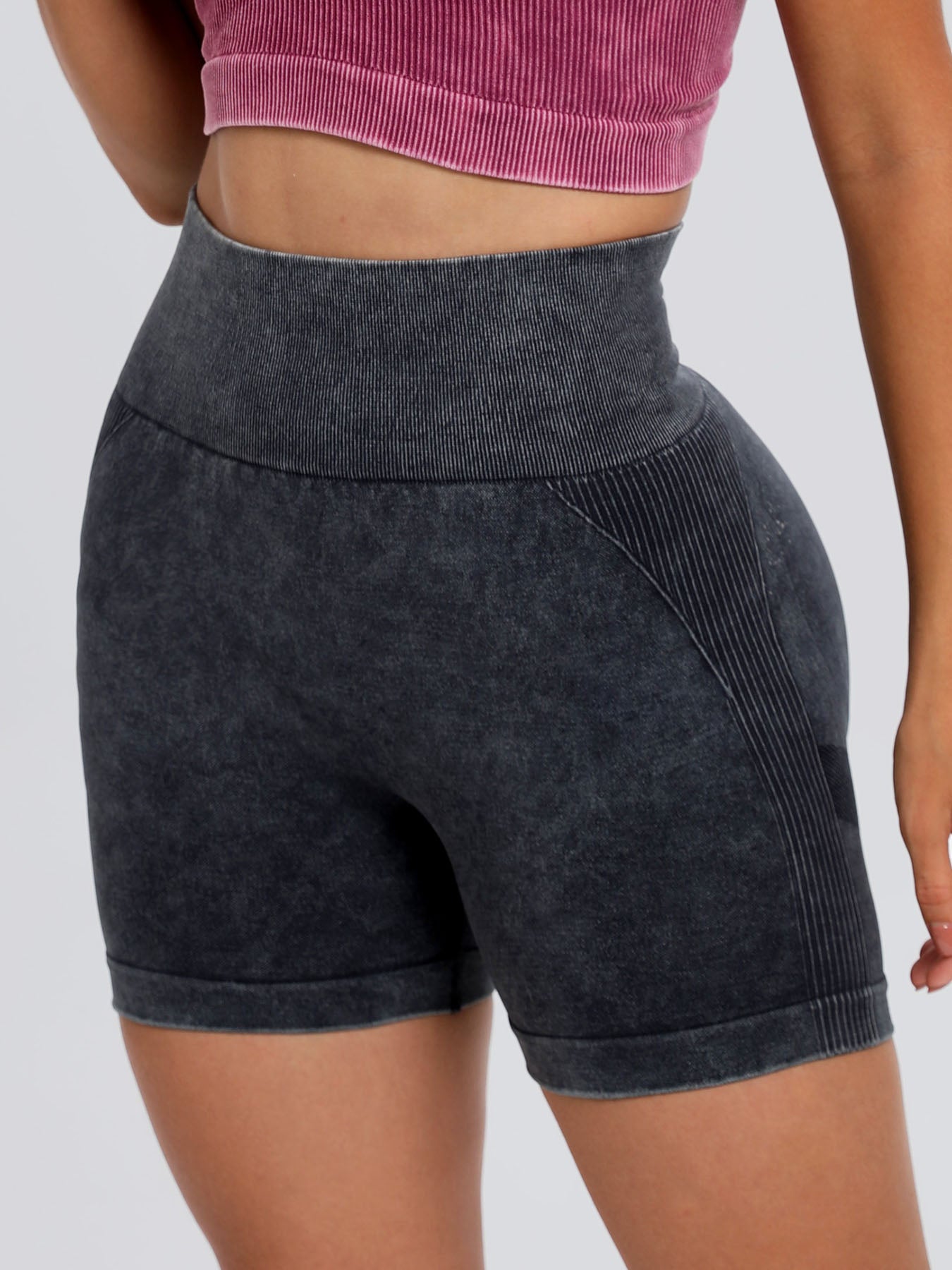 Solid drawstring smocked waist pocketed shorts.