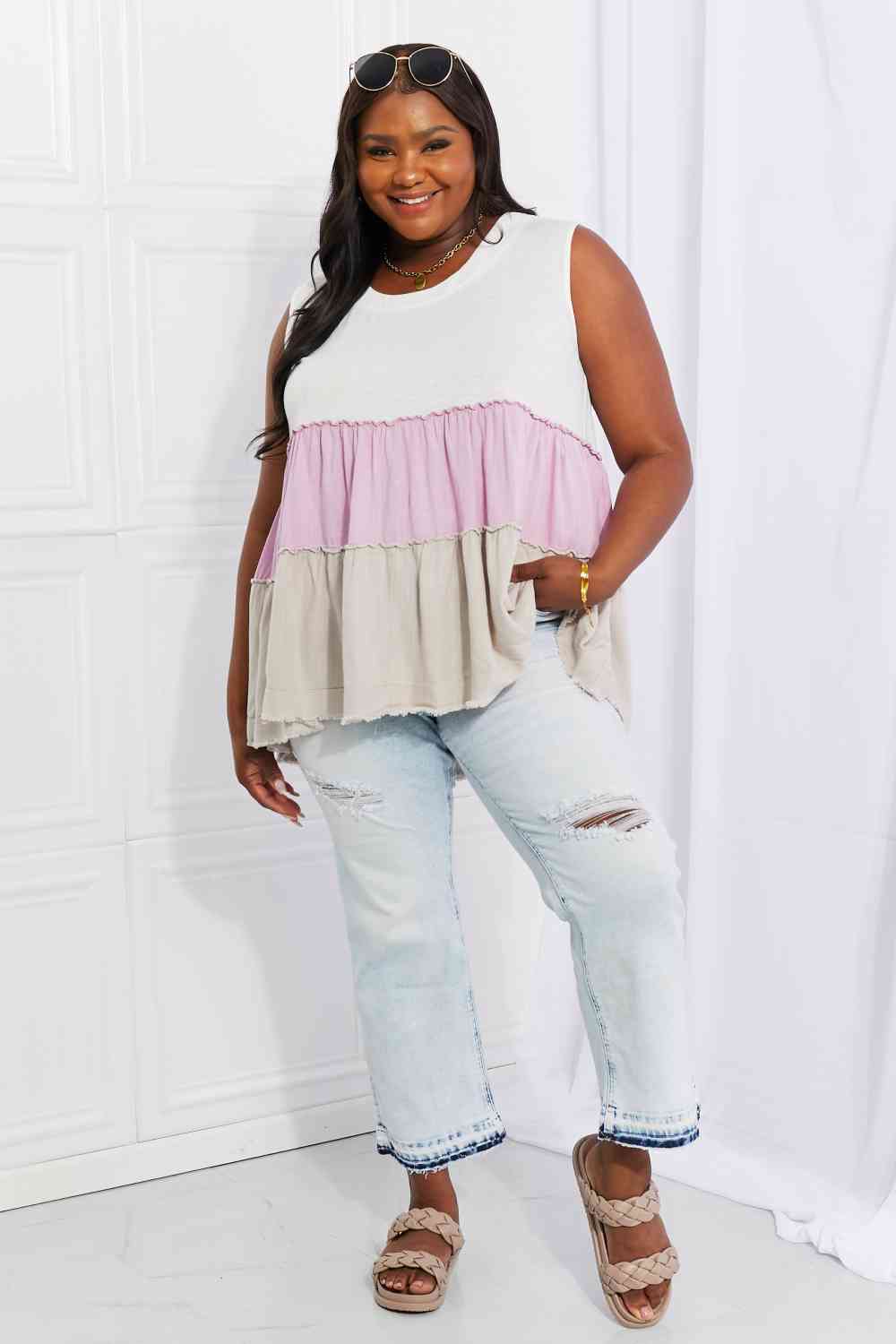 Watching the sunset color block babydoll top with tiered design, moderately stretchy.