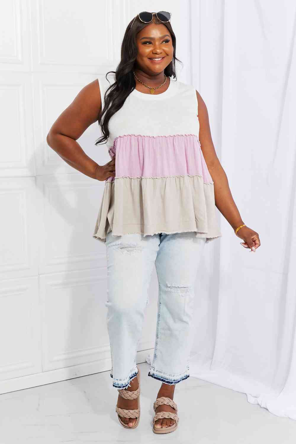 Watching the sunset color block babydoll top with tiered design, moderately stretchy.