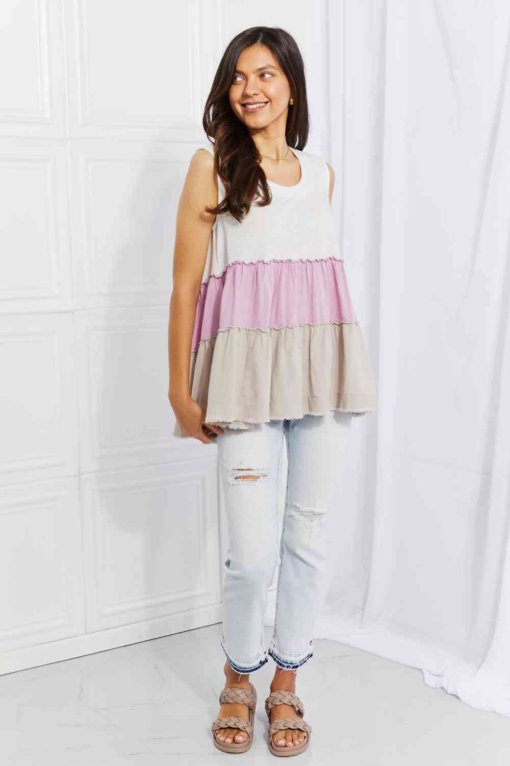 Watching the sunset color block babydoll top with tiered design, moderately stretchy.