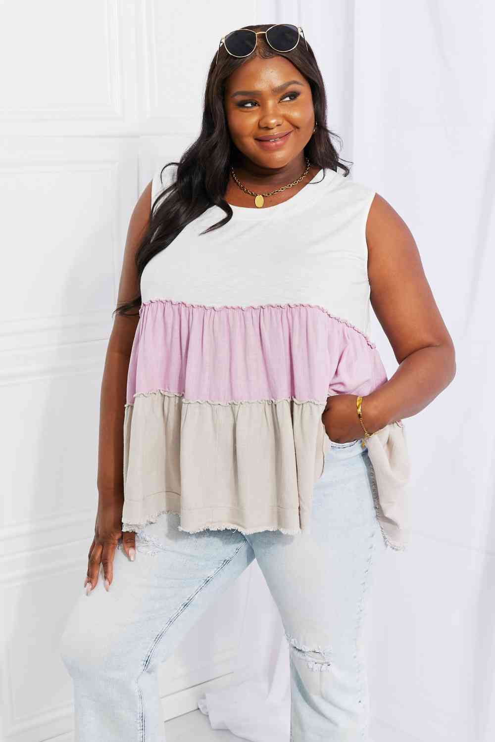 Watching the sunset color block babydoll top with tiered design, moderately stretchy.