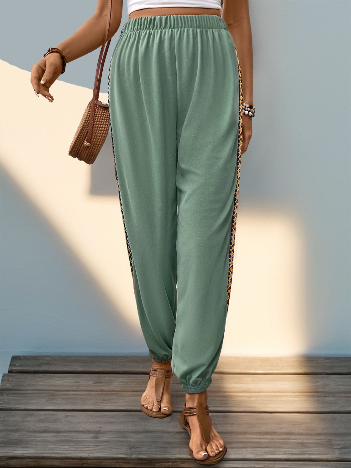 Weave band patchwork elastic waist joggers, opaque.