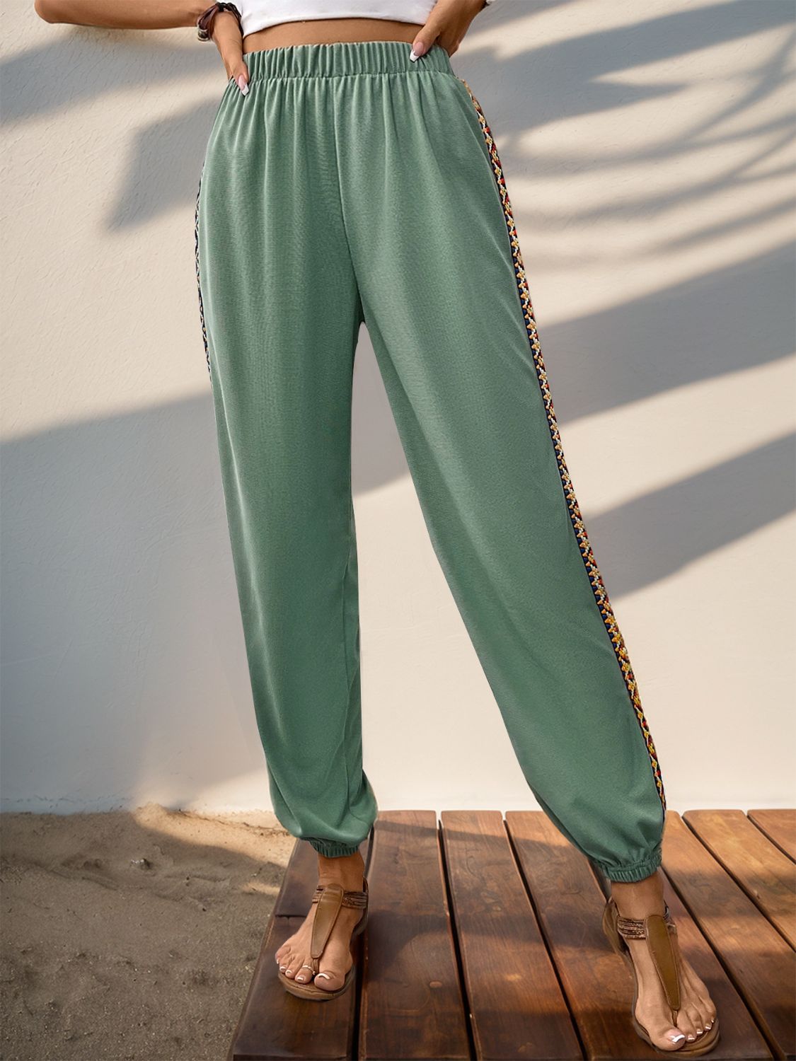 Weave band patchwork elastic waist joggers, opaque.