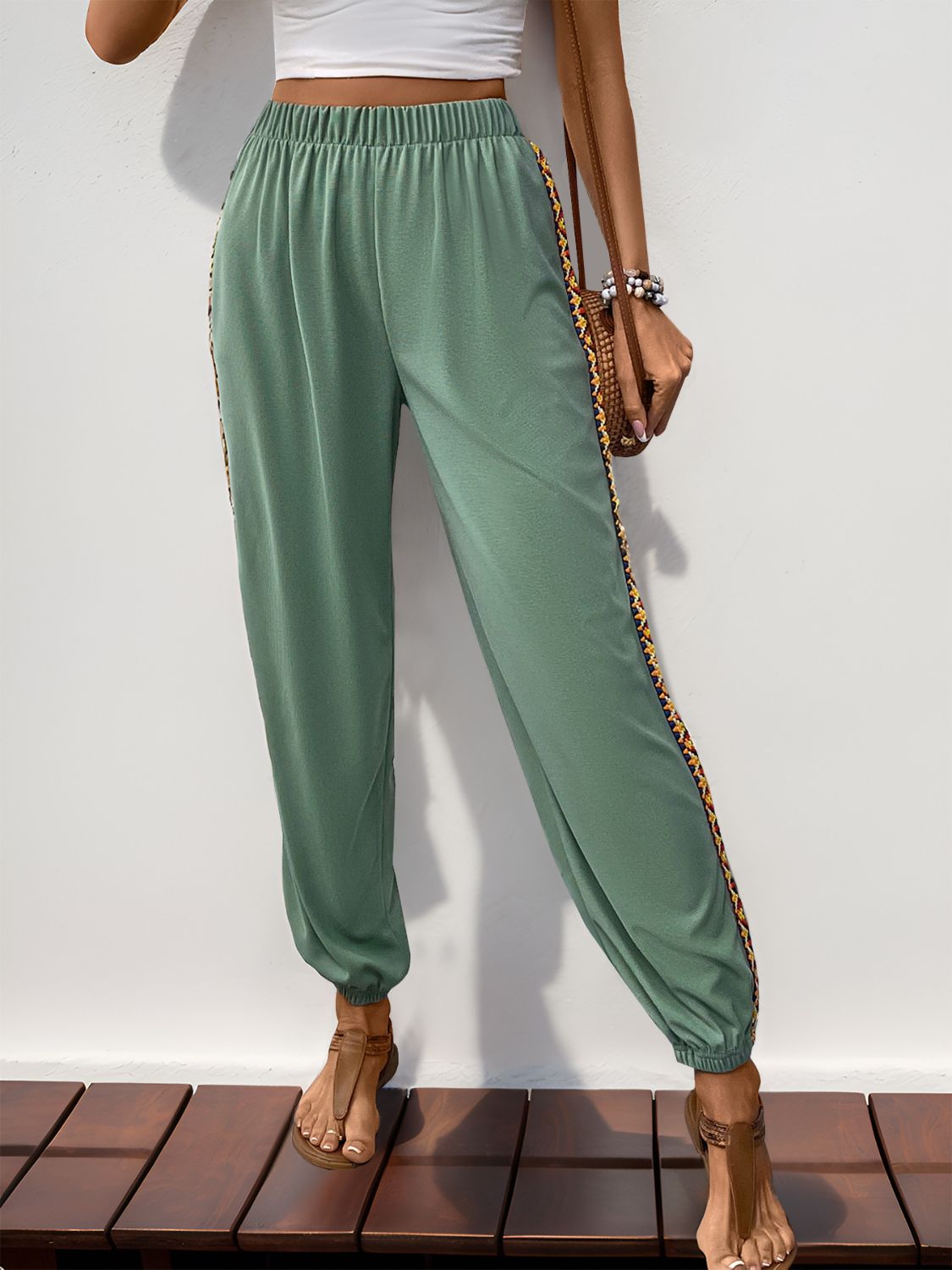 Weave band patchwork elastic waist joggers, opaque.