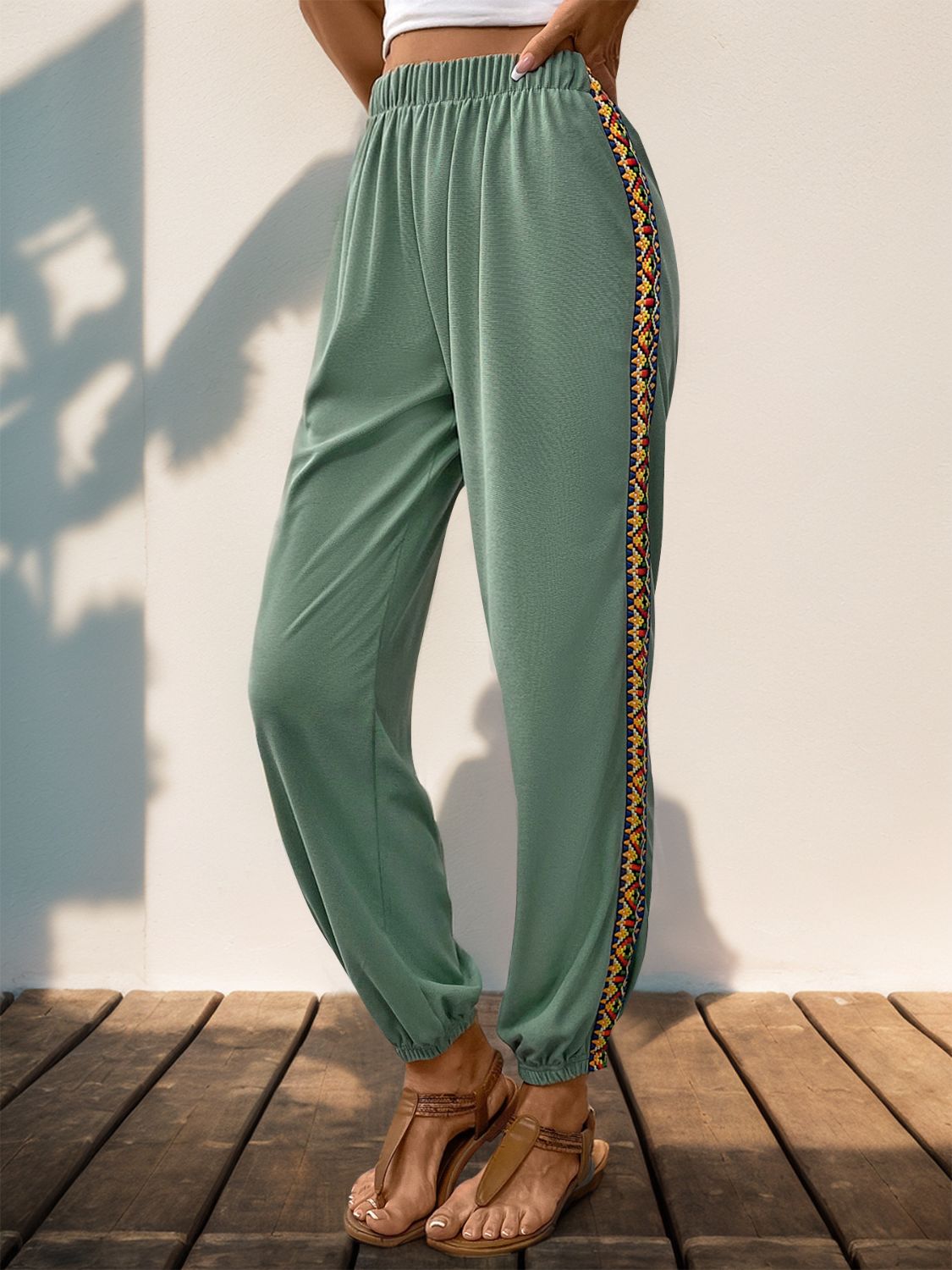 Weave band patchwork elastic waist joggers, opaque.