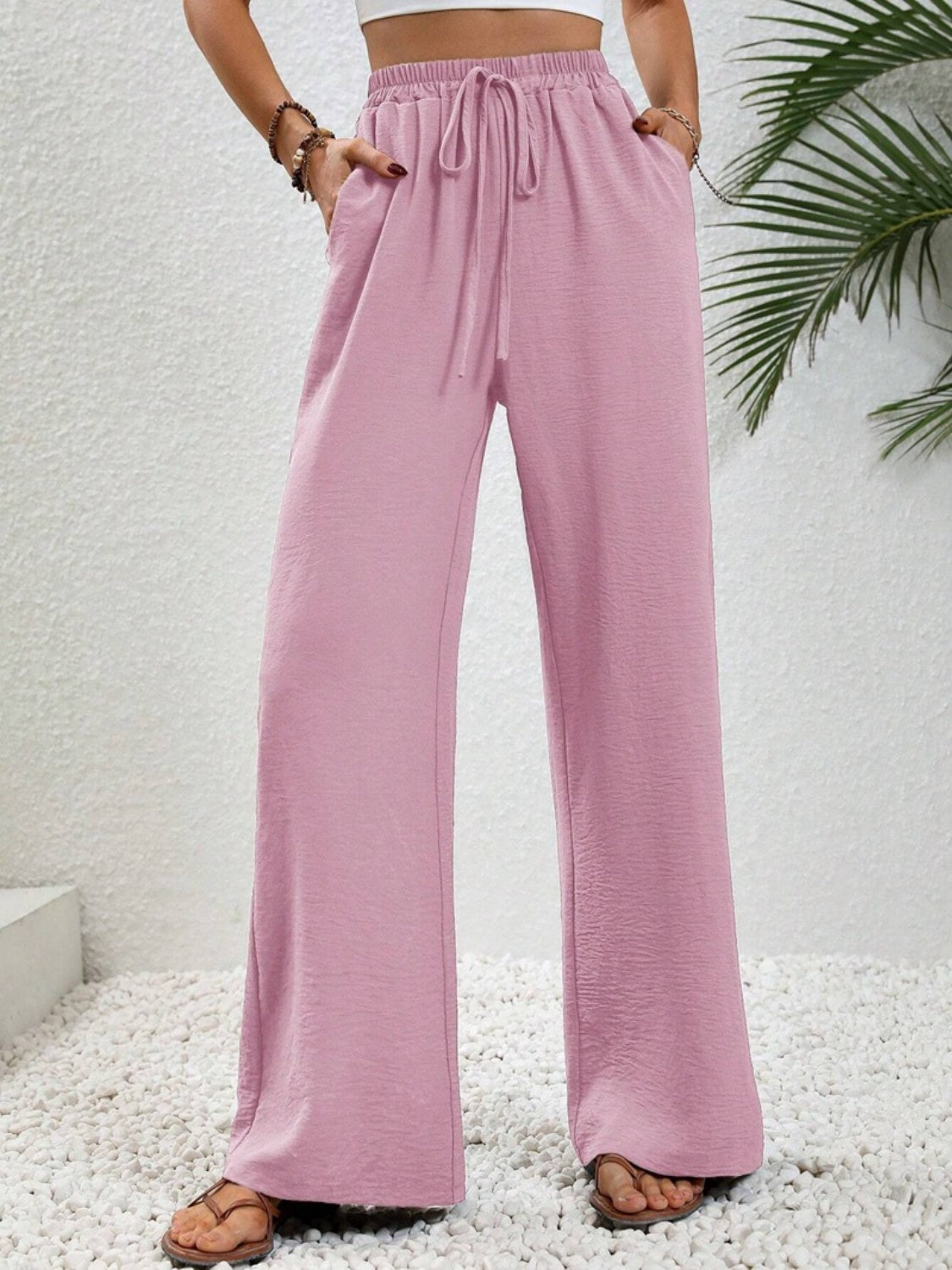Wide leg drawstring pants, opaque.