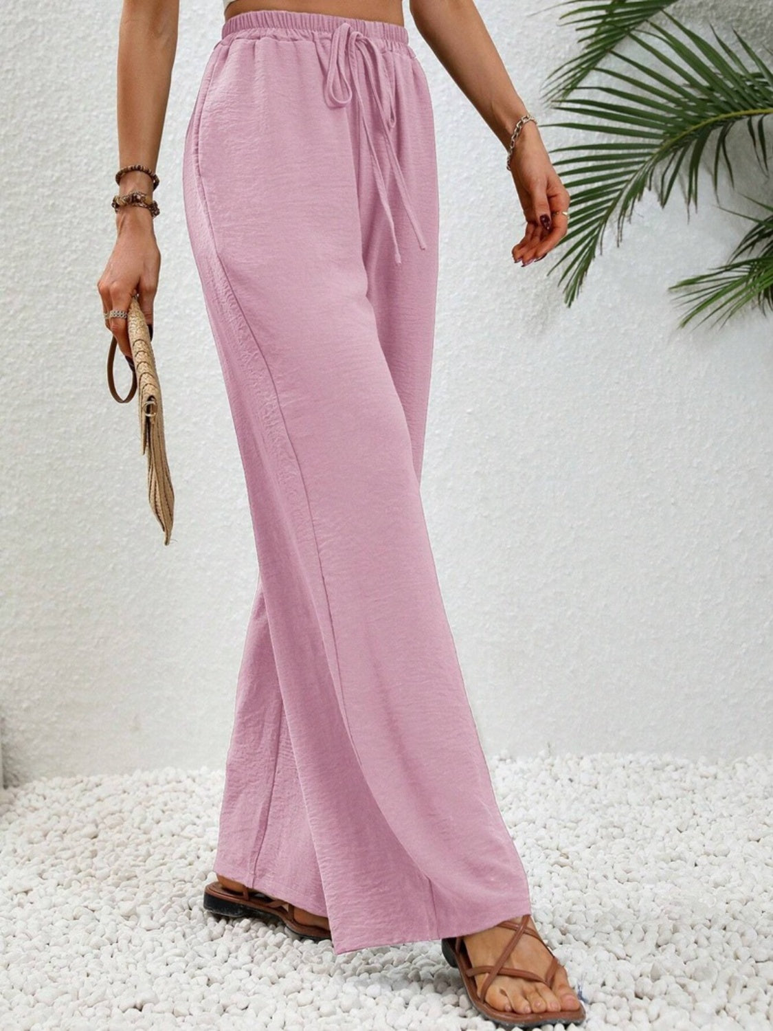 Wide leg drawstring pants, opaque.