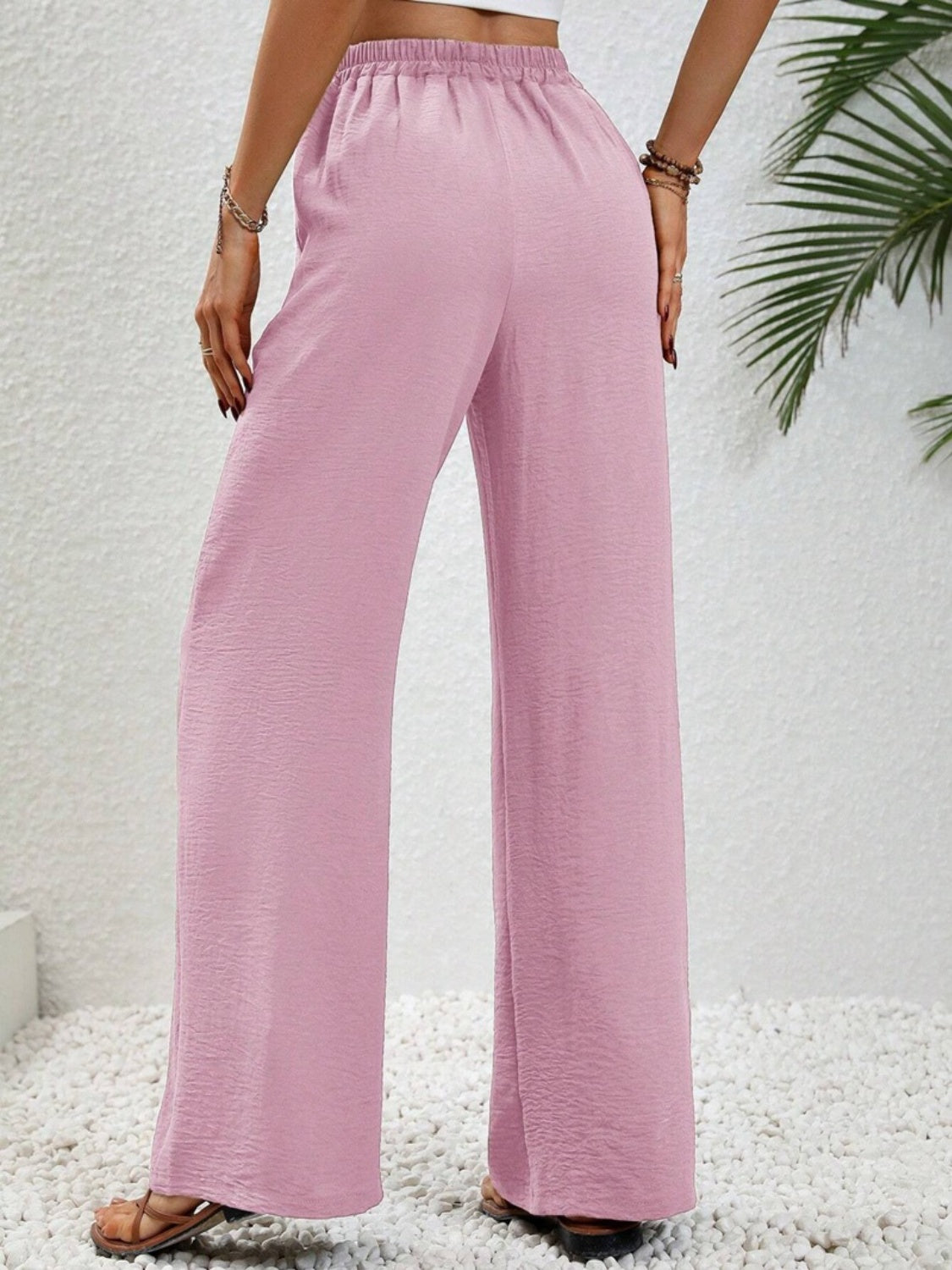 Wide leg drawstring pants, opaque.
