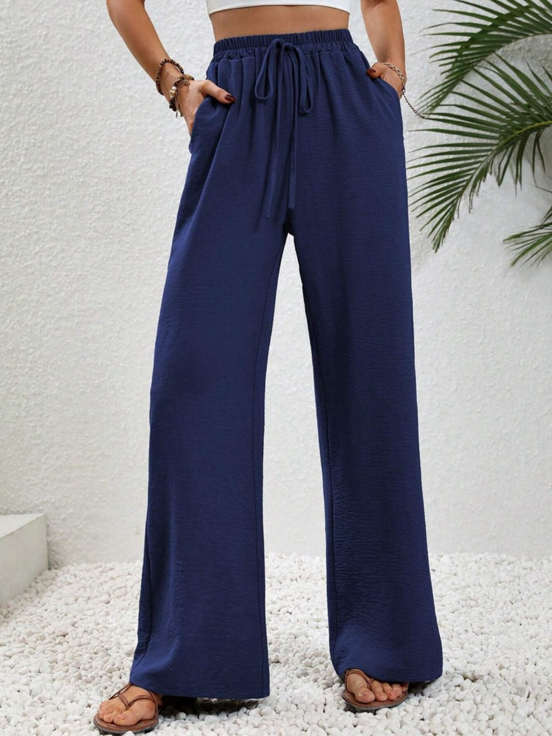 Wide leg drawstring pants, opaque.