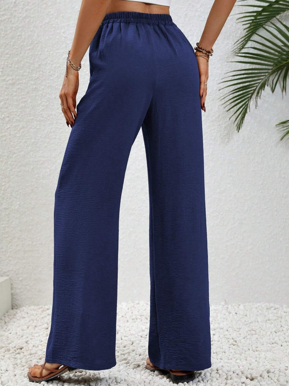 Wide leg drawstring pants, opaque.