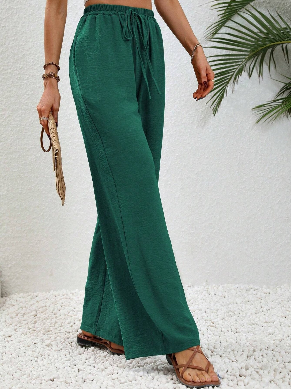 Wide leg drawstring pants, opaque.