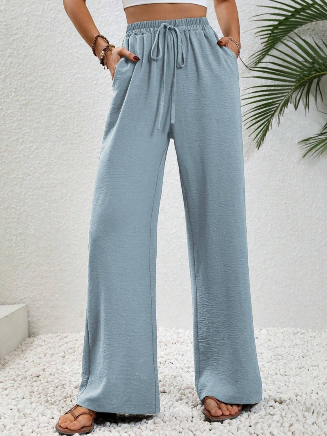 Wide leg drawstring pants, opaque.