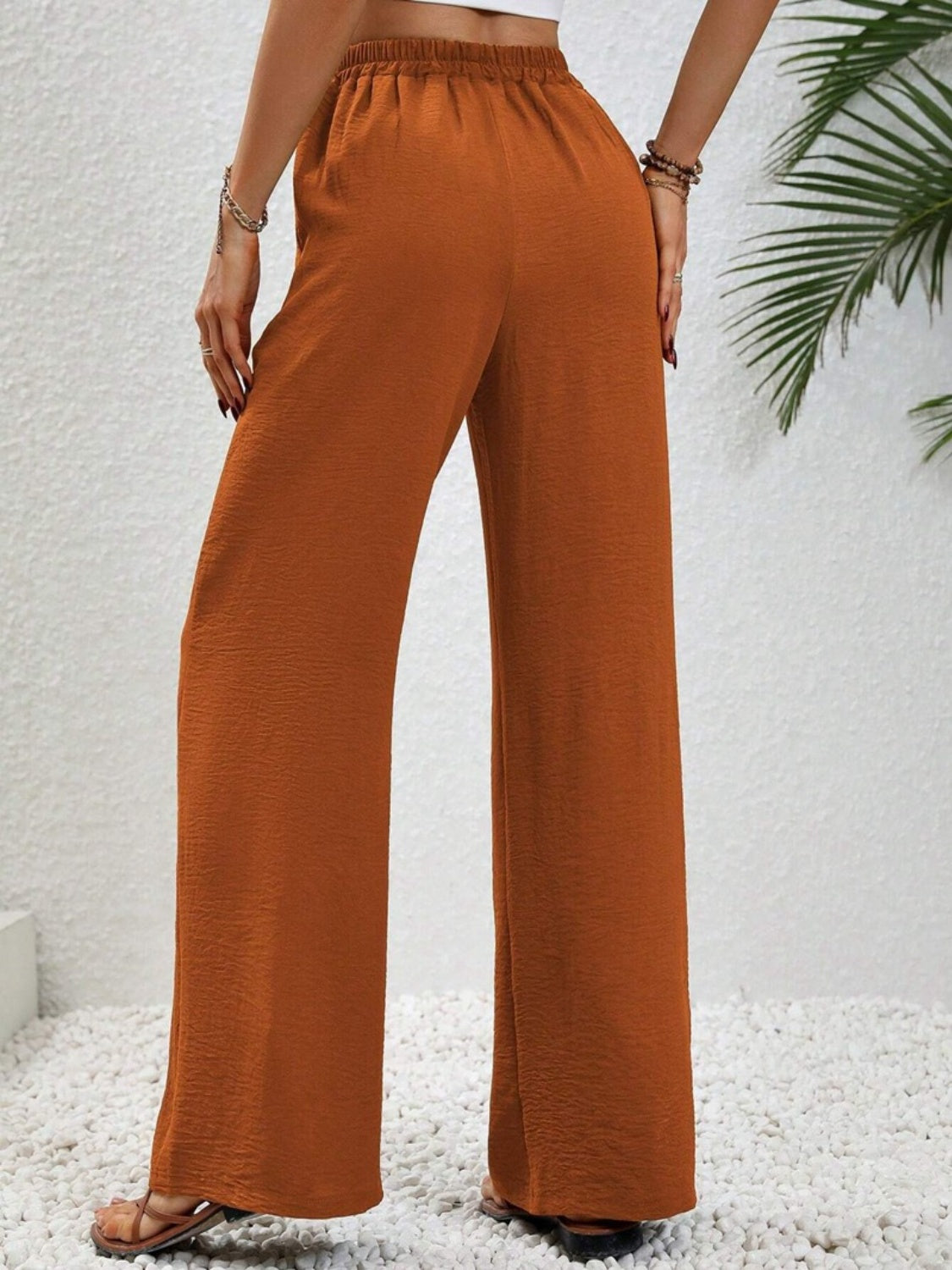 Wide leg drawstring pants, opaque.