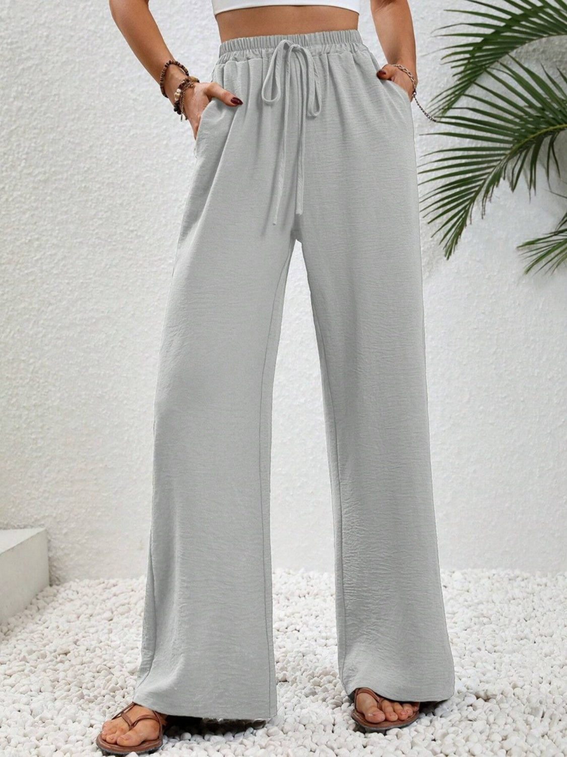 Wide leg drawstring pants, opaque.