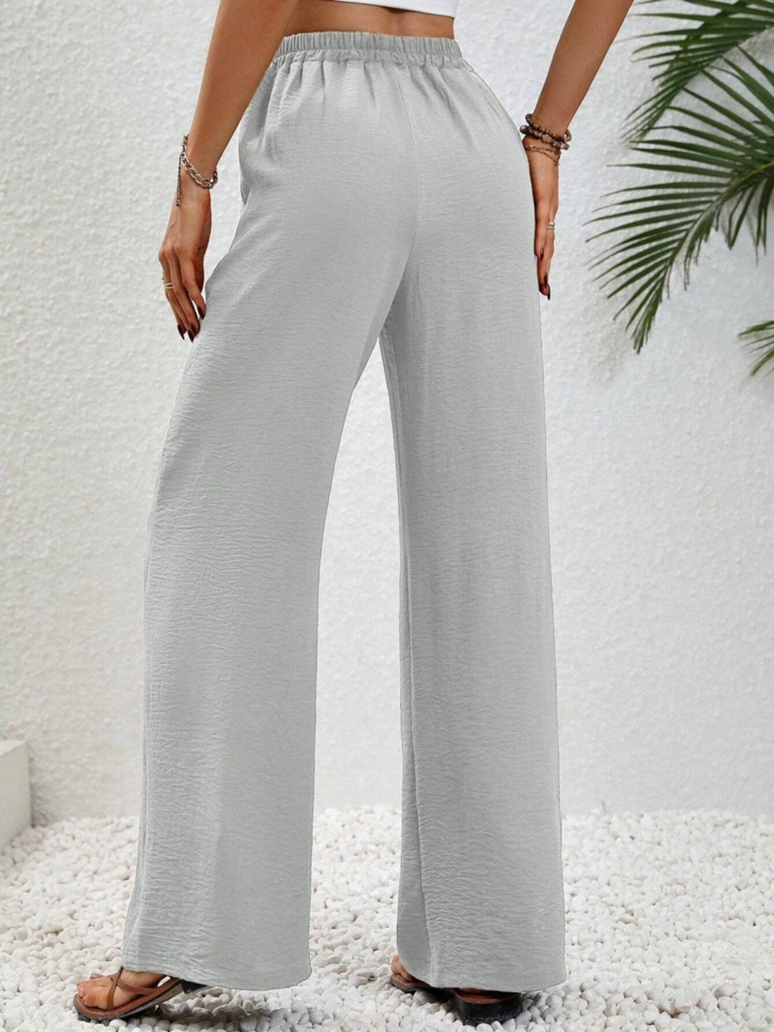 Wide leg drawstring pants, opaque.