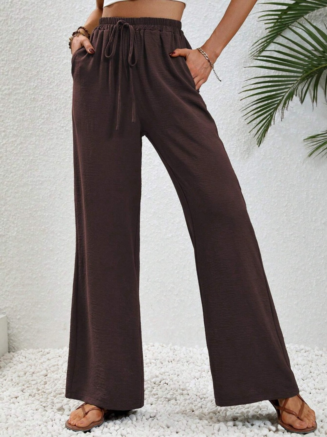 Wide leg drawstring pants, opaque.