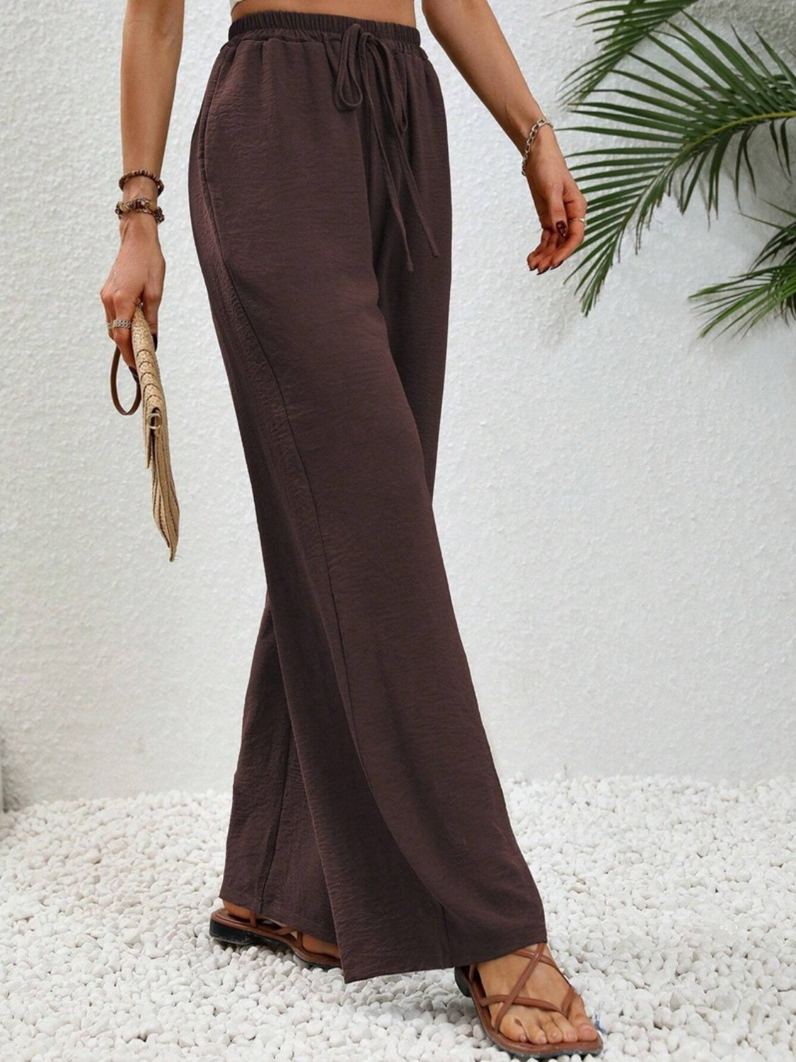 Wide leg drawstring pants, opaque.