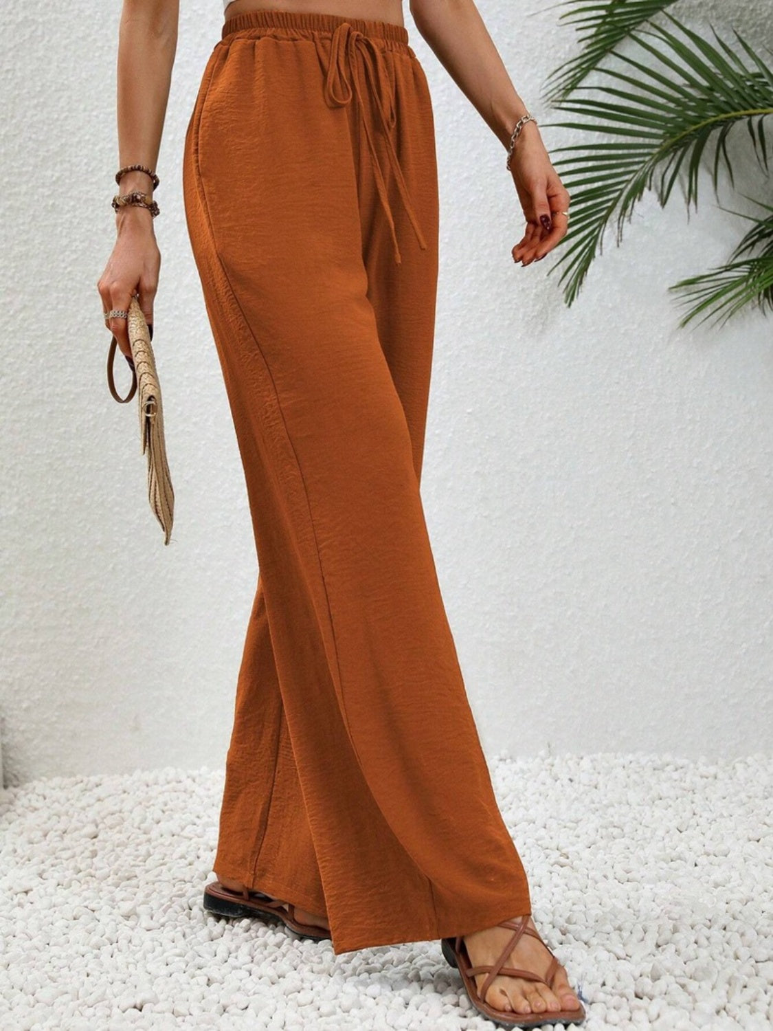 Wide leg drawstring pants, opaque.
