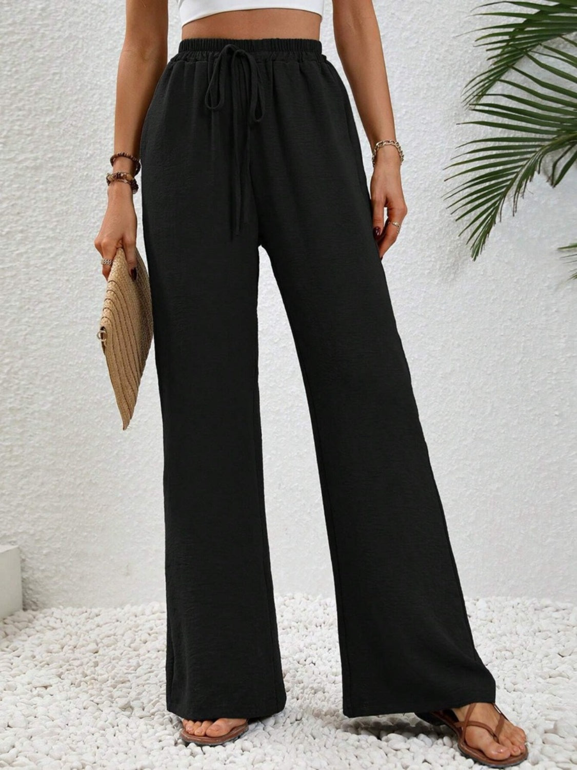 Wide leg drawstring pants, opaque.
