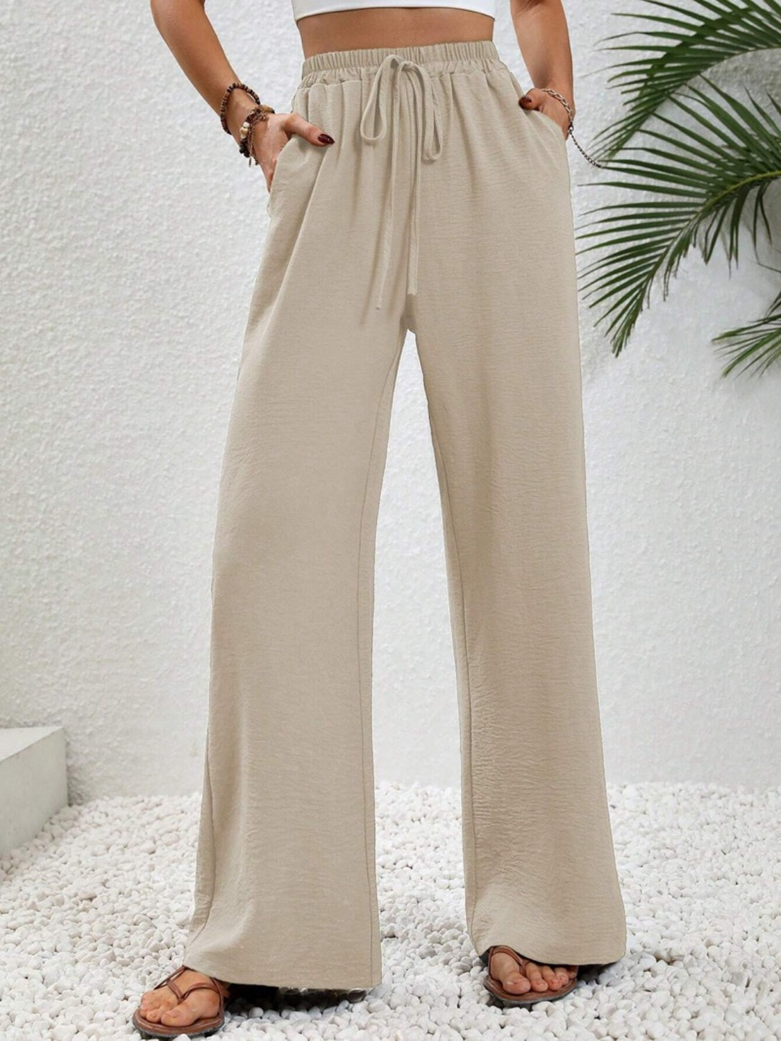 Wide leg drawstring pants, opaque.