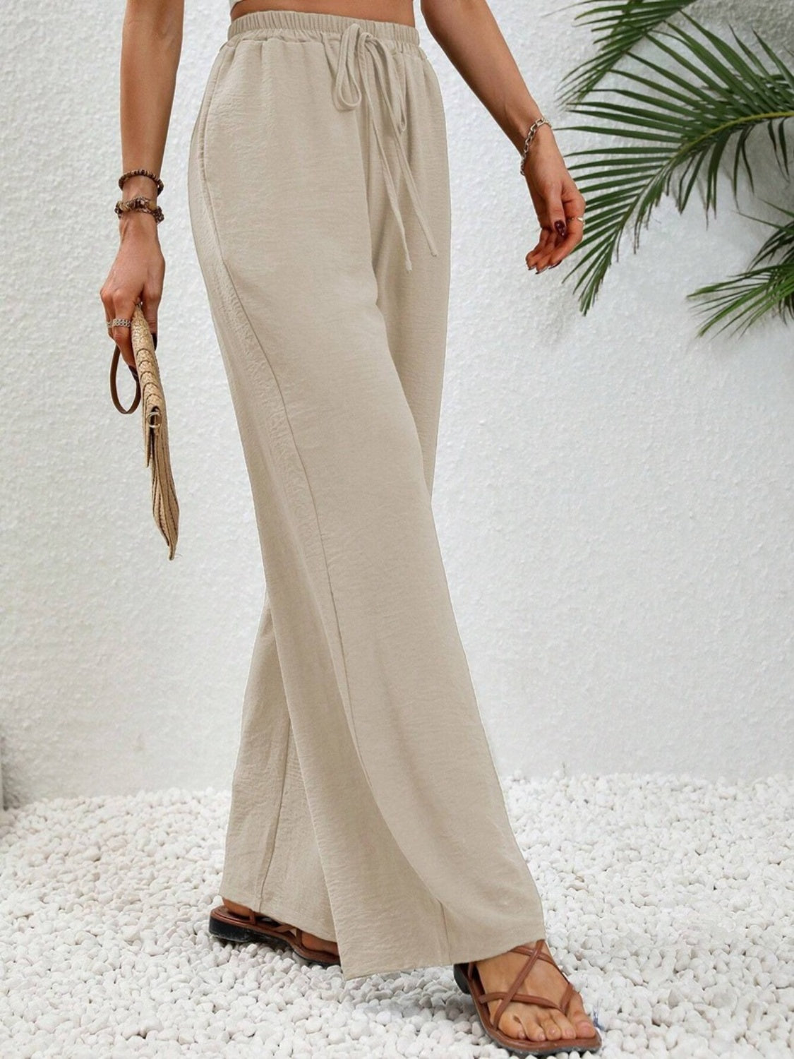 Wide leg drawstring pants, opaque.