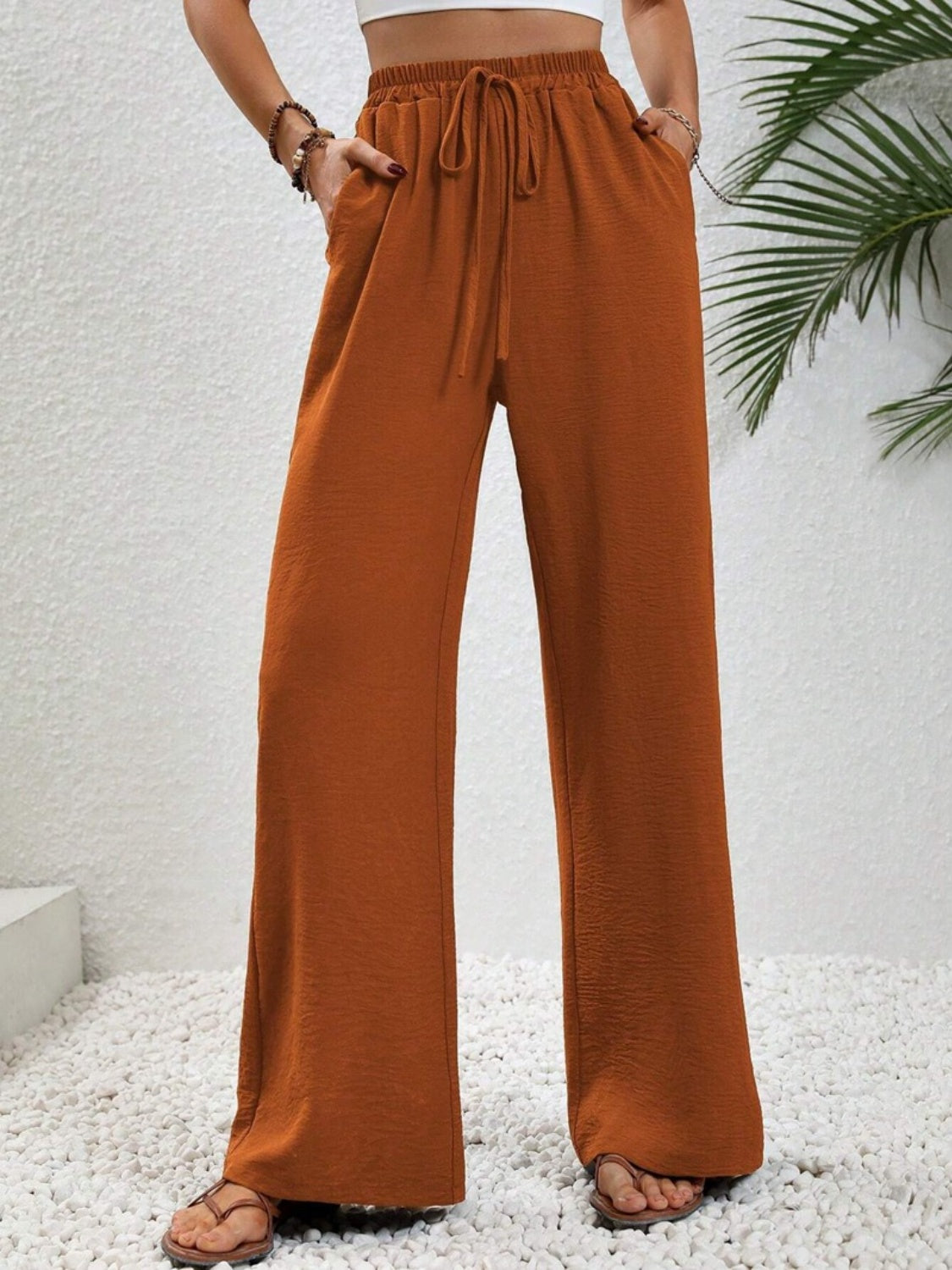 Wide leg drawstring pants, opaque.
