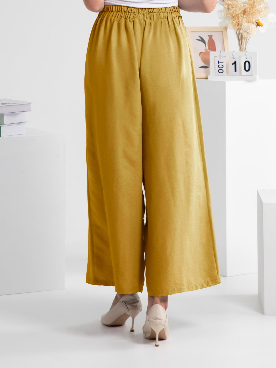 Wide leg elastic waist pants, opaque.