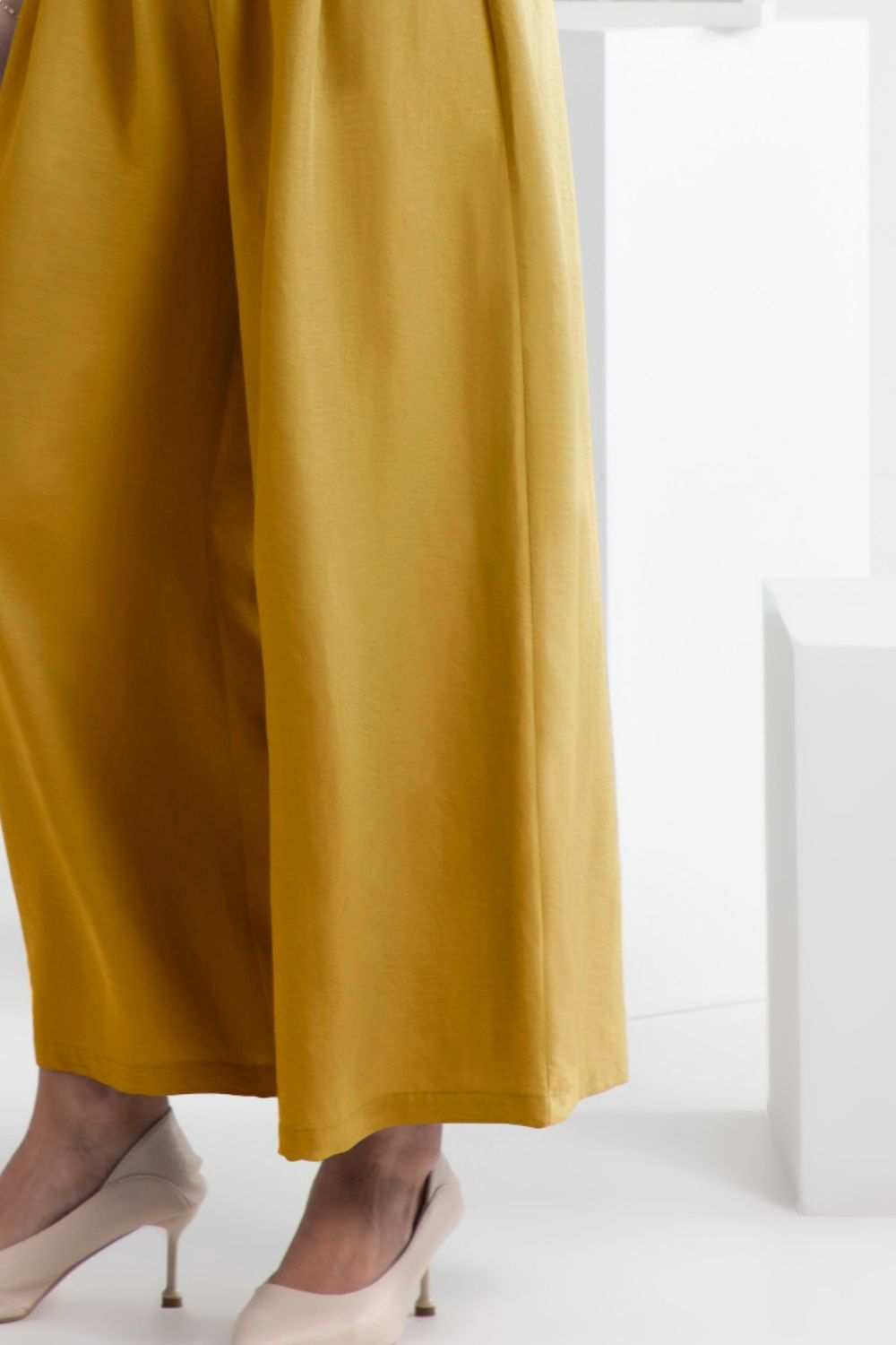 Wide leg elastic waist pants, opaque.