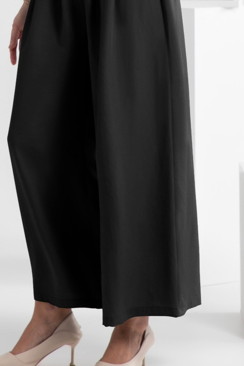 Wide leg elastic waist pants, opaque.