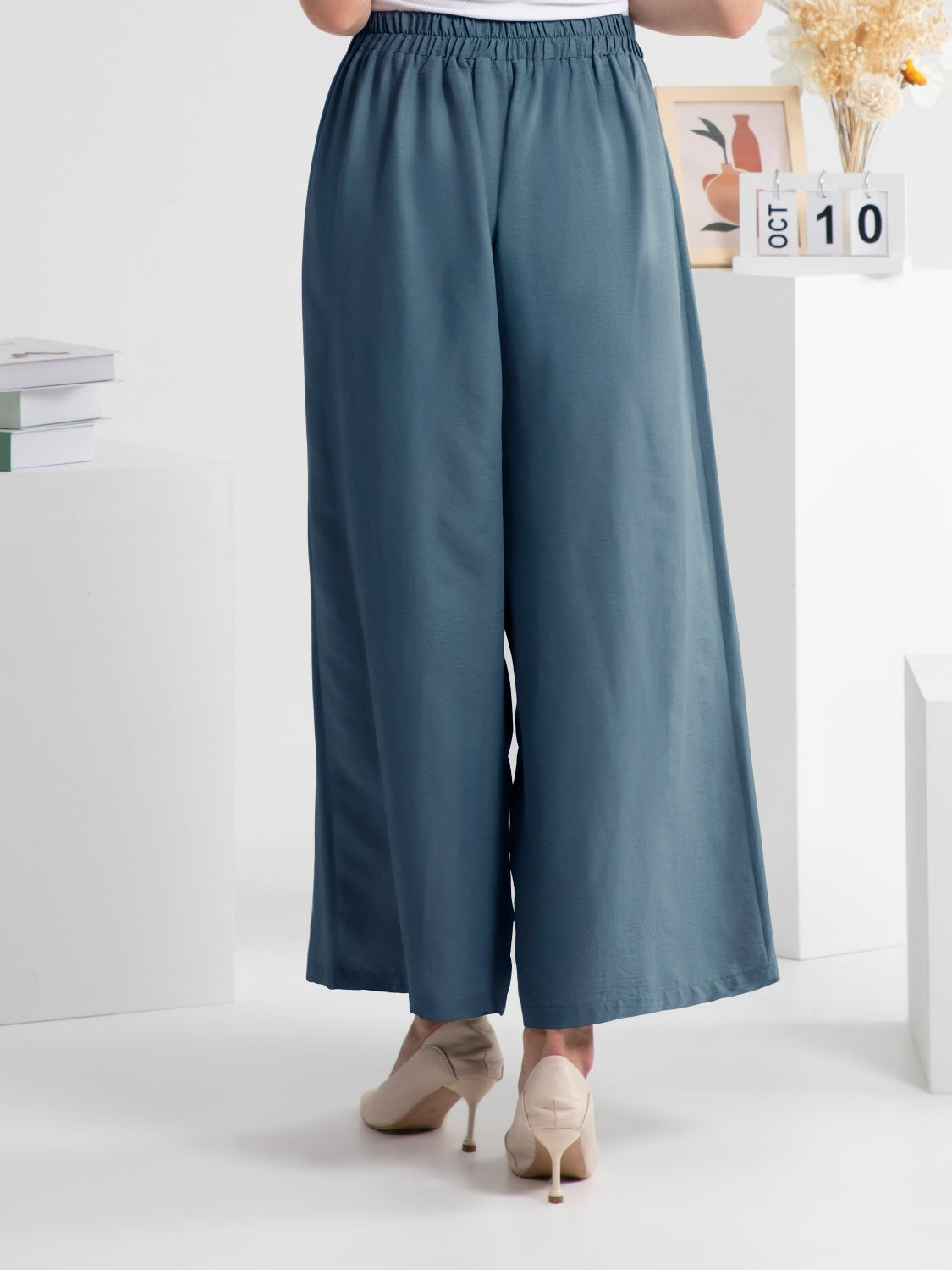 Wide leg elastic waist pants, opaque.