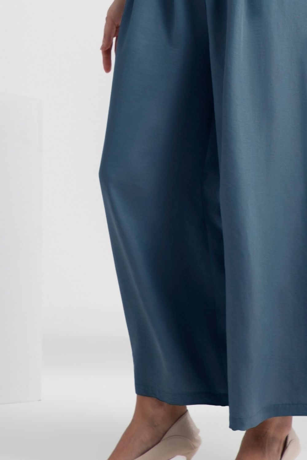 Wide leg elastic waist pants, opaque.