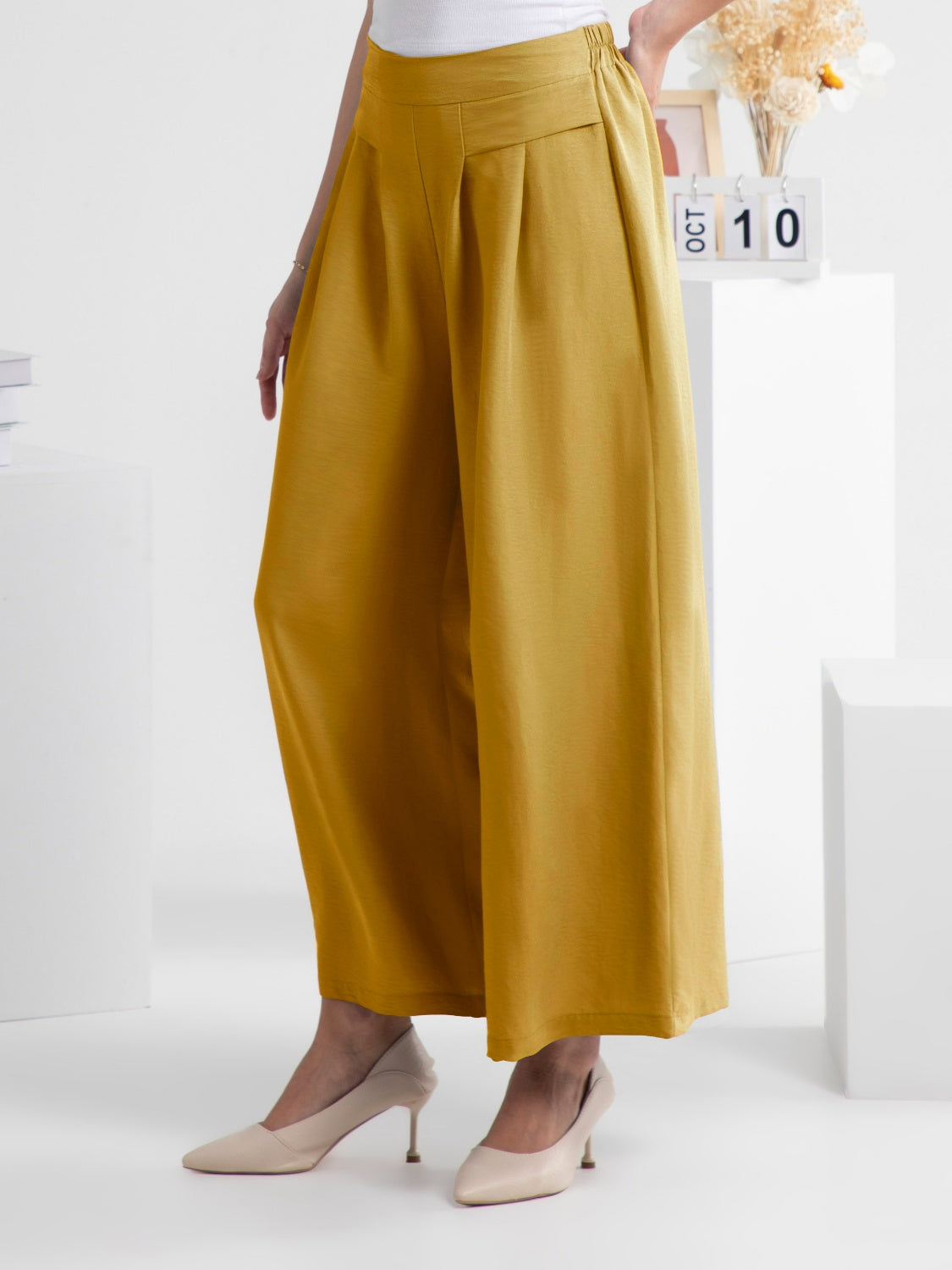 Wide leg elastic waist pants, opaque.