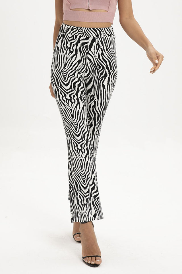 Zebra print straight leg pants, moderate stretch.