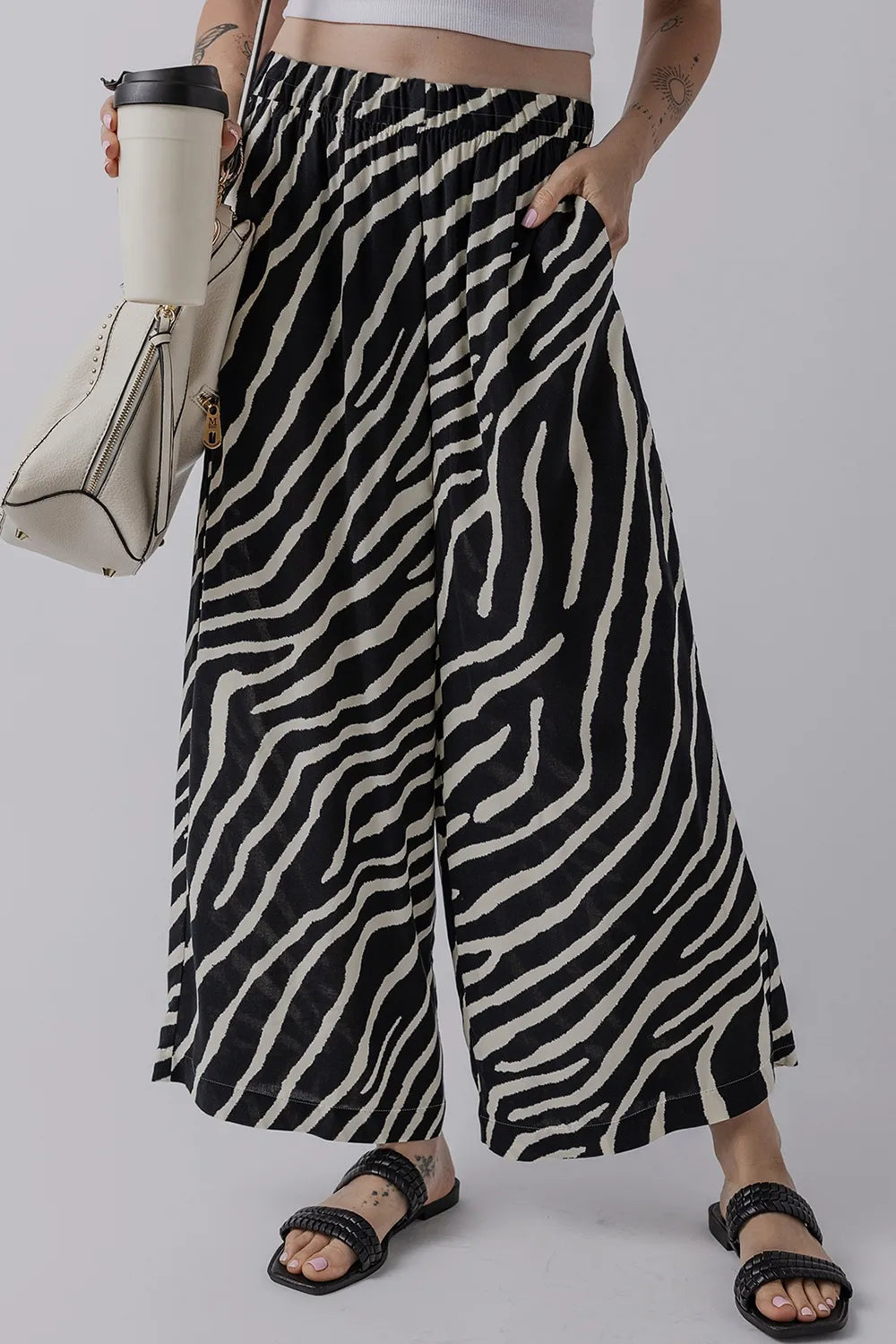 Zebra striped summer wide leg pants with pockets.