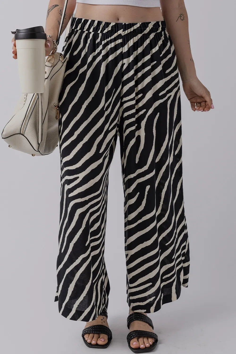 Zebra striped summer wide leg pants with pockets.