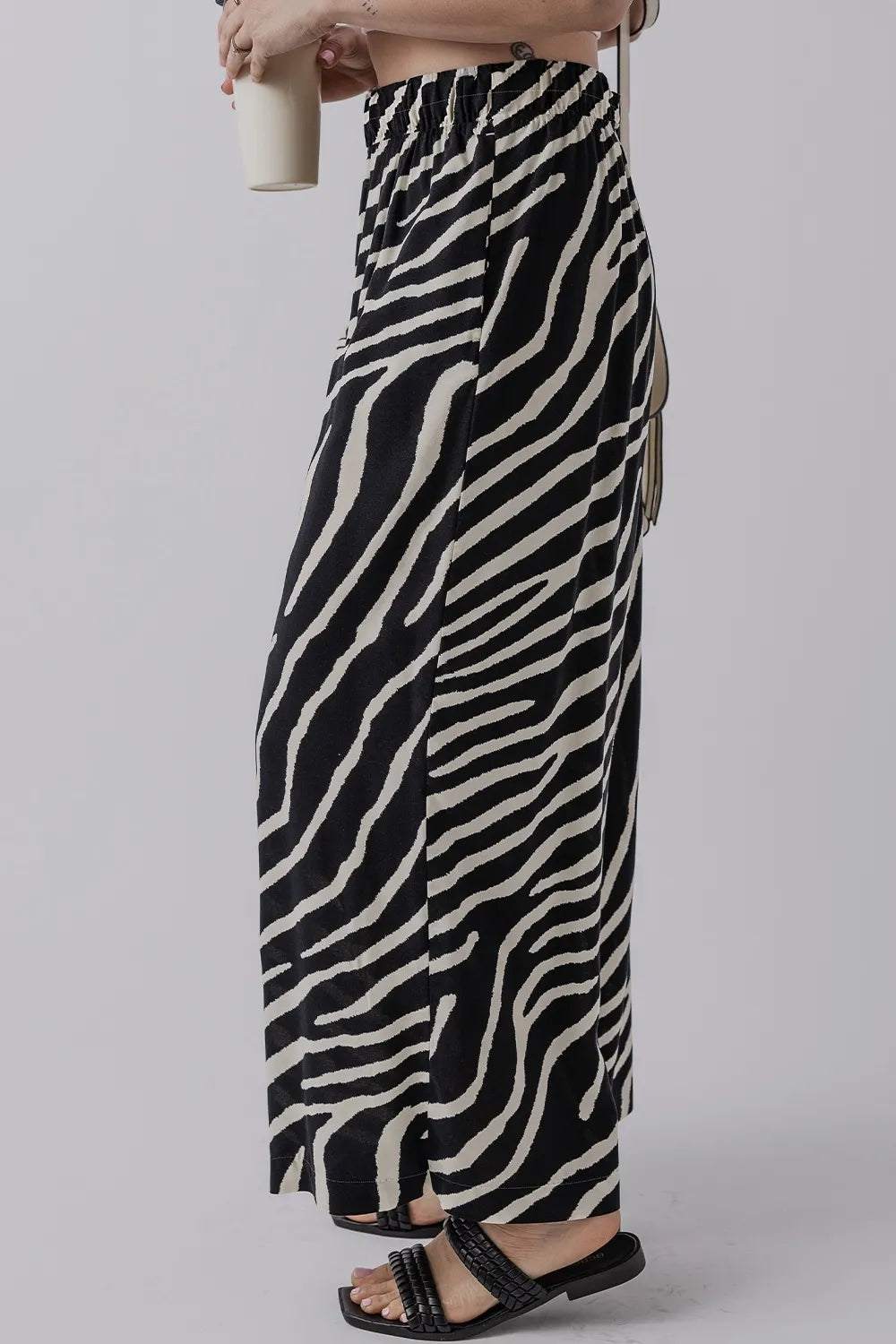 Zebra striped summer wide leg pants with pockets.