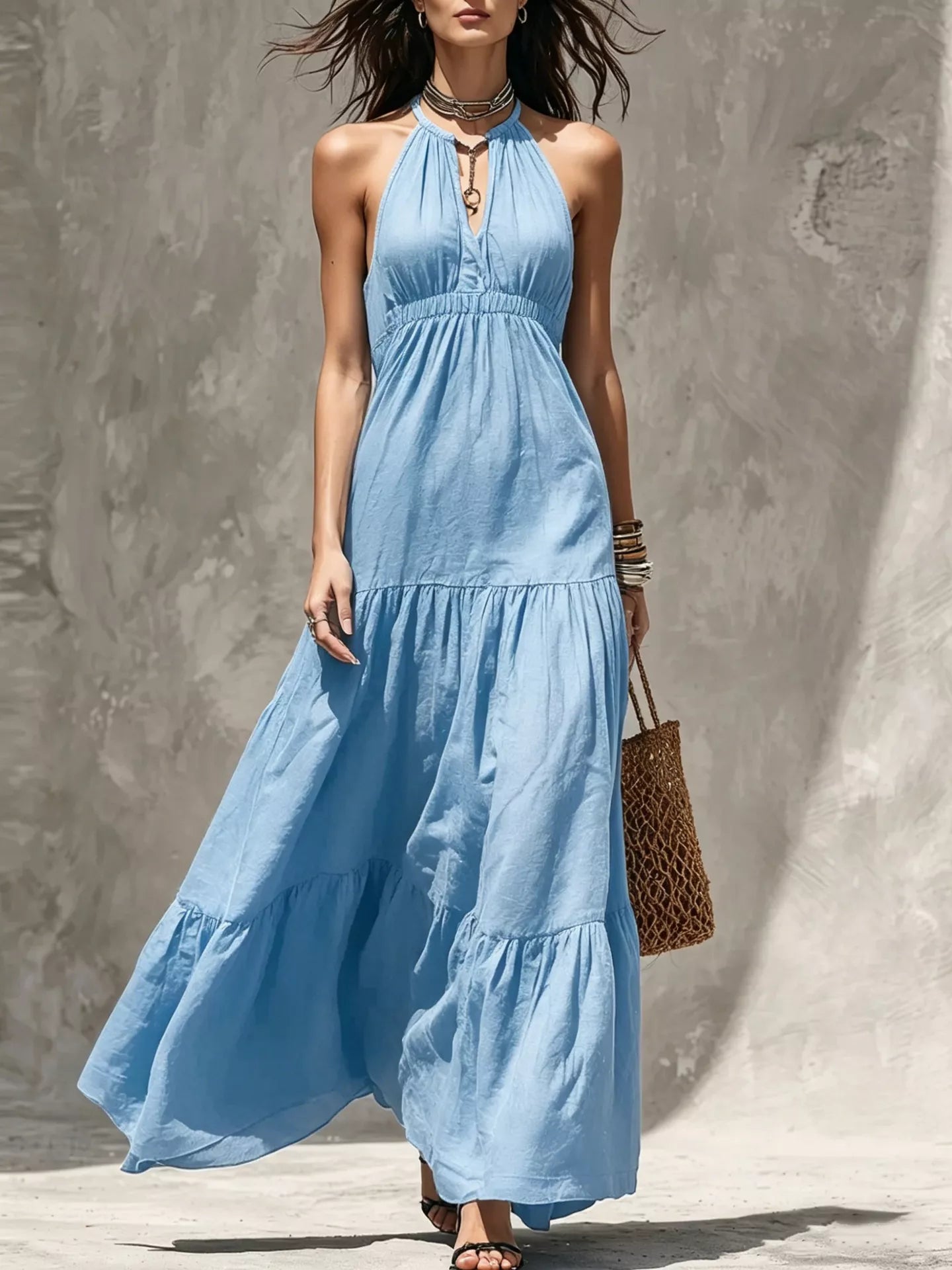 Sleeveless olive green tiered maxi dress with smocked waist and halter neckline