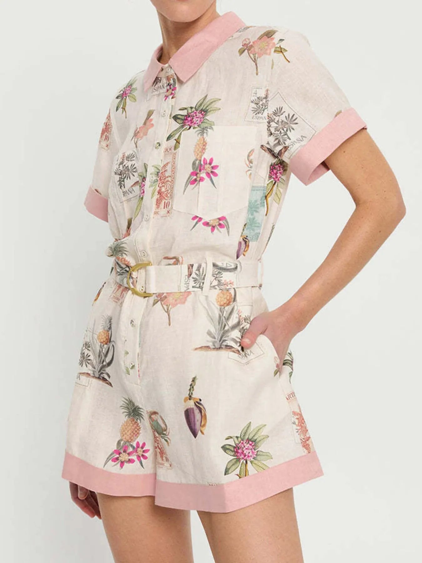 Printed Short Sleeve Romper with Belt and Pockets.