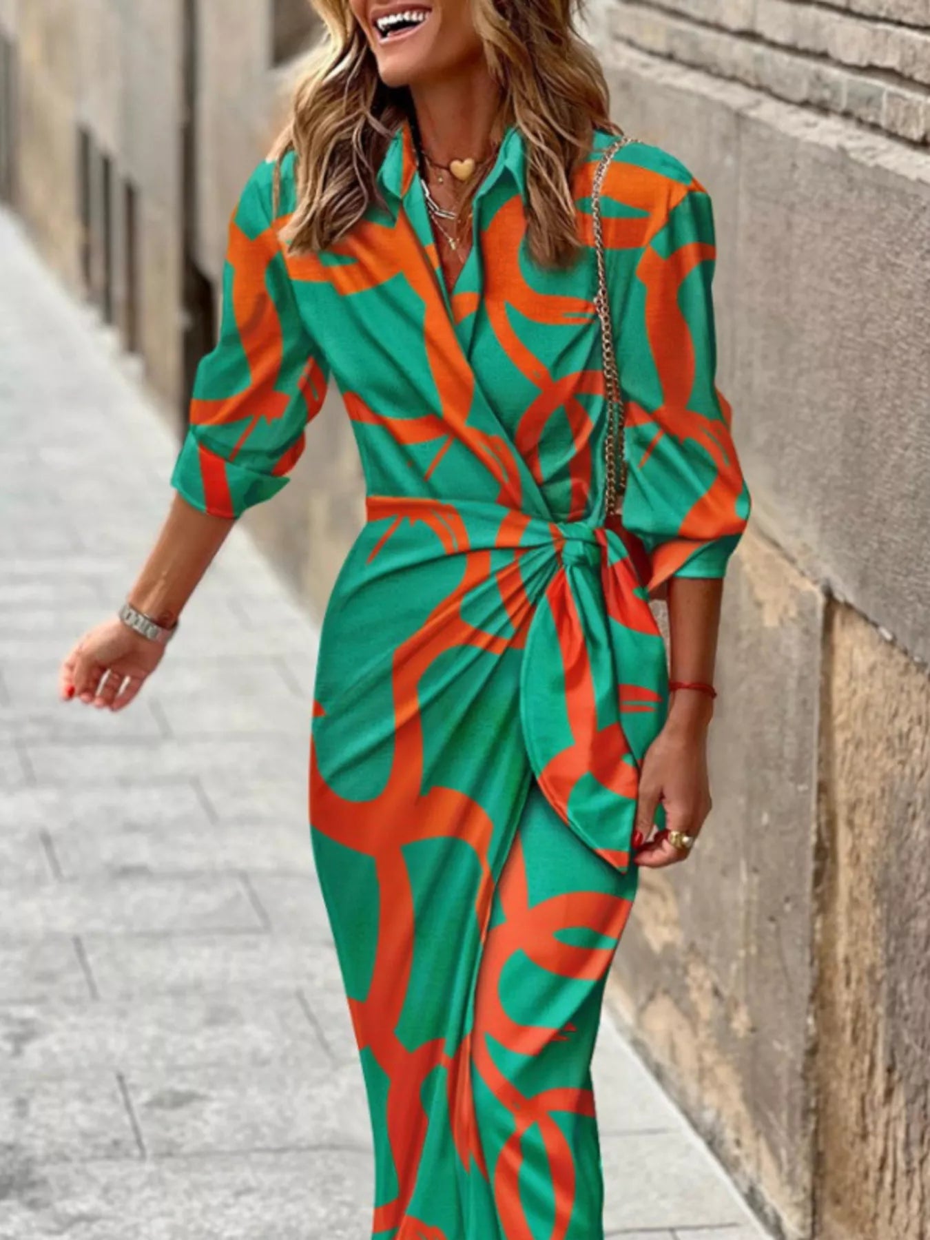 Green and red abstract-print collared midi shirt dress with three-quarter sleeves and a tied waist