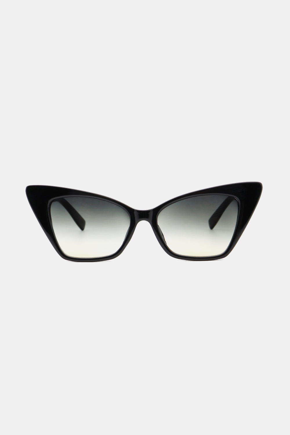 Black cat-eye sunglasses feature a bold upswept silhouette, sculpted polycarbonate frame, and gradient acetate lenses in a front-facing view.