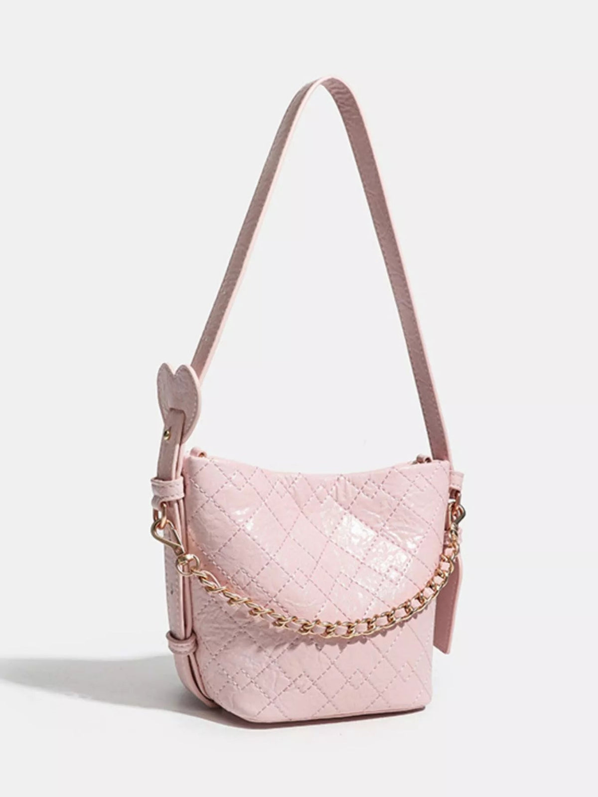 Small pink PU leather bucket bag with diamond quilting, an adjustable shoulder strap, gold-tone chain detail, and a compact structured silhouette.