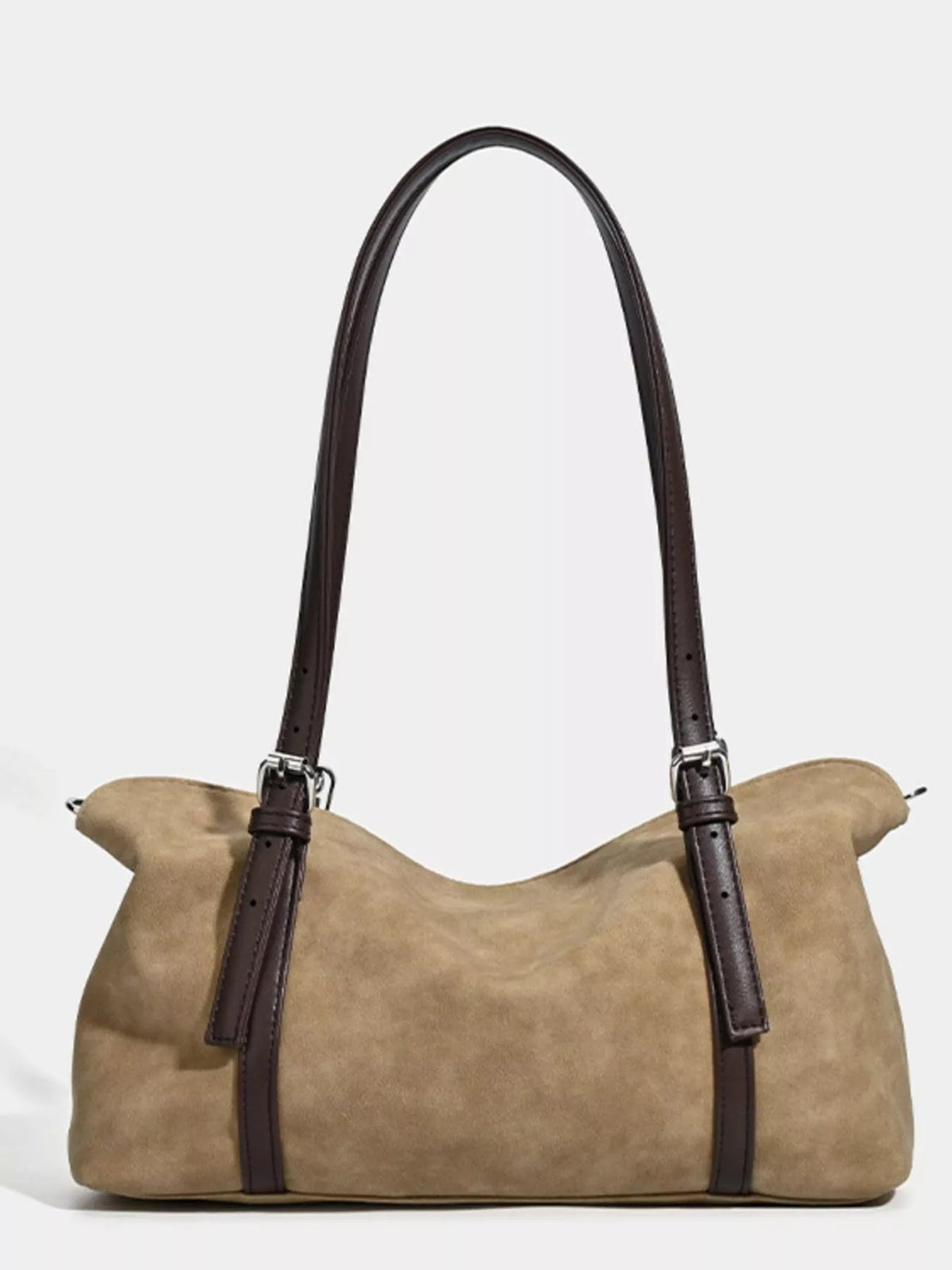 Medium tan suede shoulder bag with a soft slouchy silhouette, dark brown adjustable straps, and visible buckle hardware with stitched construction.