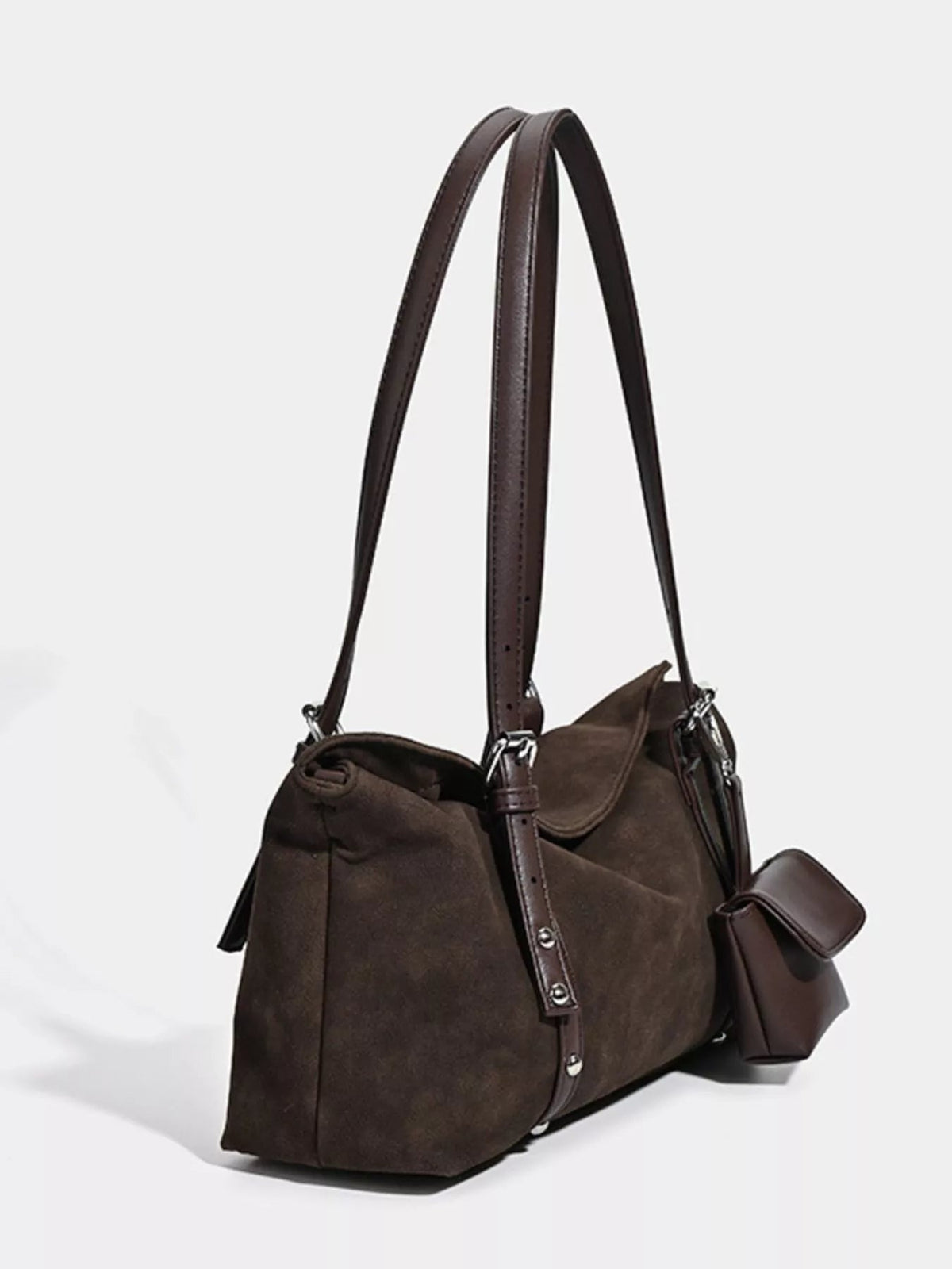 Medium brown suede shoulder bag with adjustable straps, a slouchy silhouette, flap closure, central leather buckle detail, and side pouch.