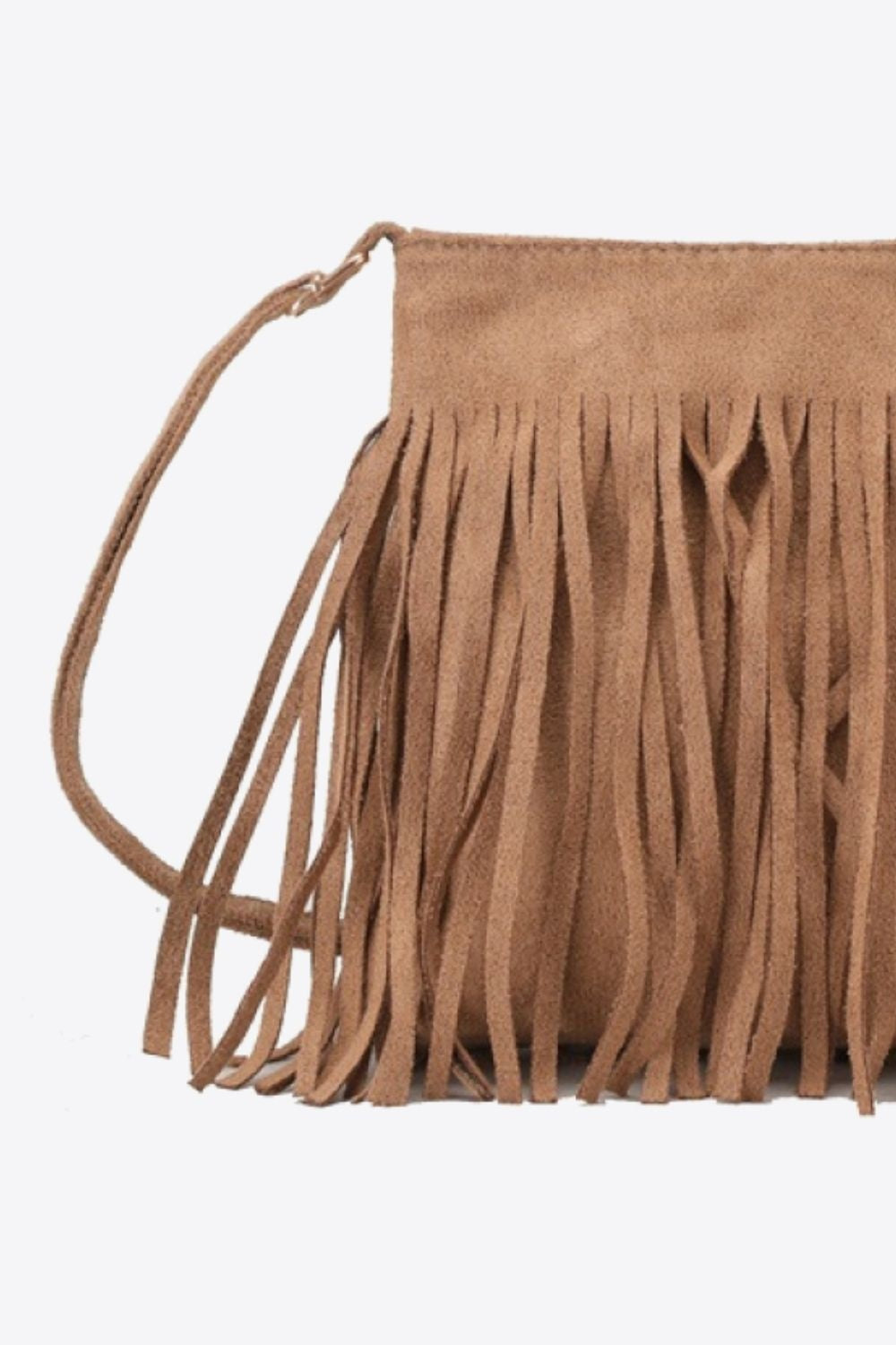 Tan PU leather crossbody sling bag with a compact rectangular silhouette, long fringe, and a slim adjustable strap attached at the sides.
