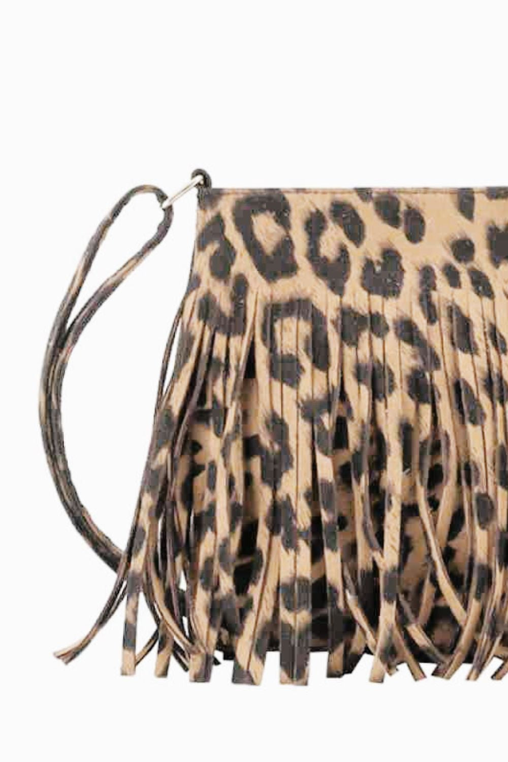 Small leopard-print PU leather crossbody bag with a compact sling silhouette, long fringe detailing, and a slim strap attached at the top.